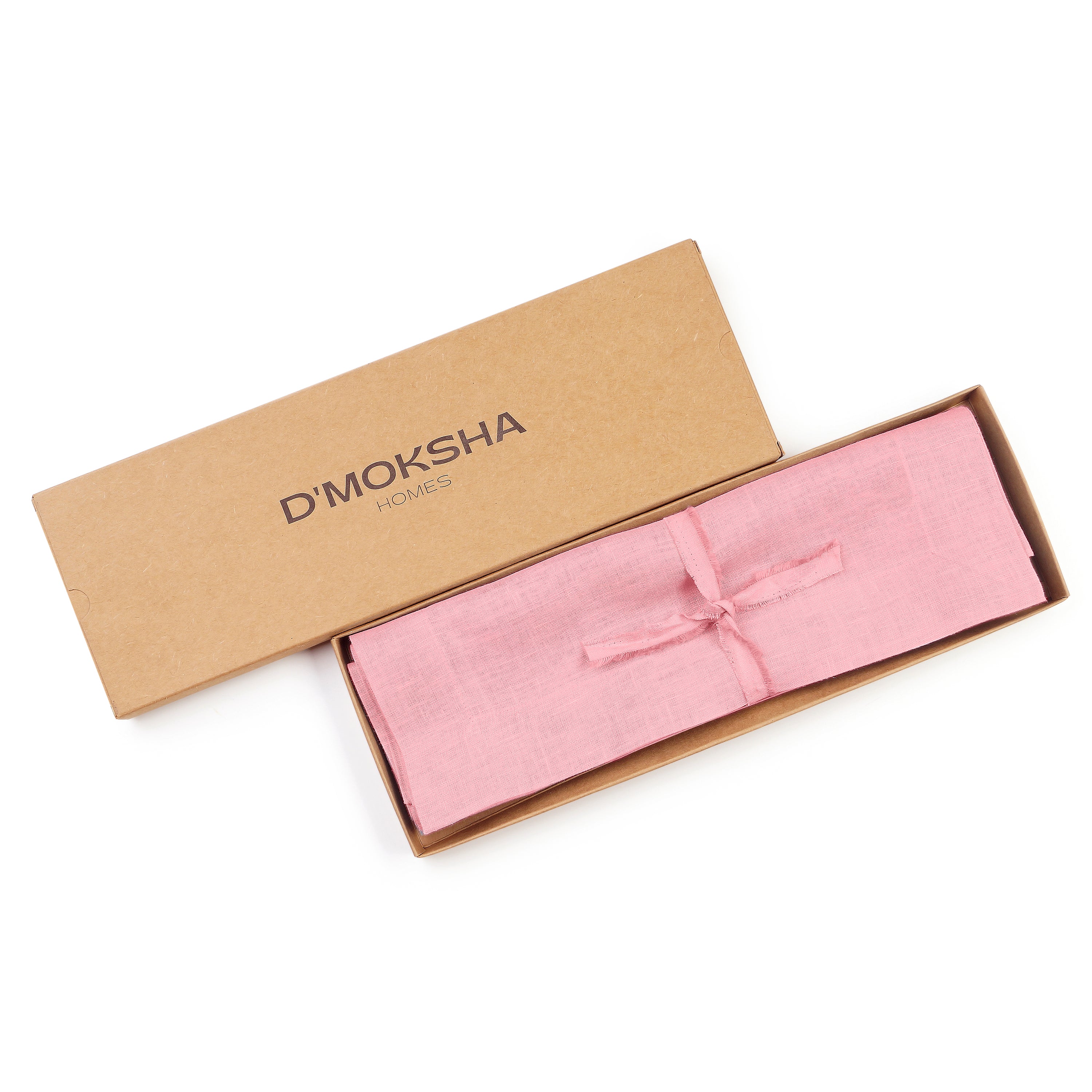 Dusty pink pure linen placemats folded to show fabric texture