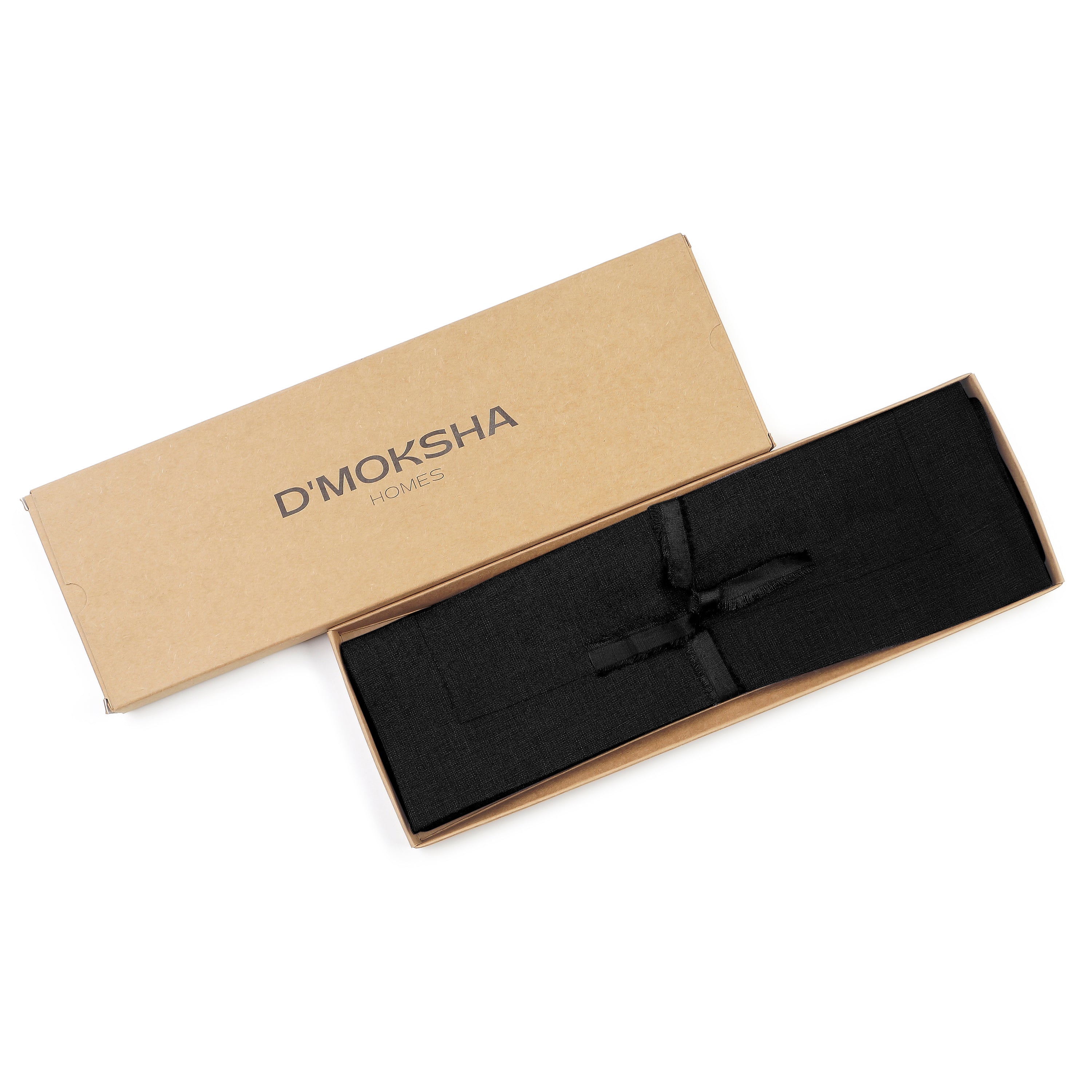 Black linen placemats folded to show fabric texture