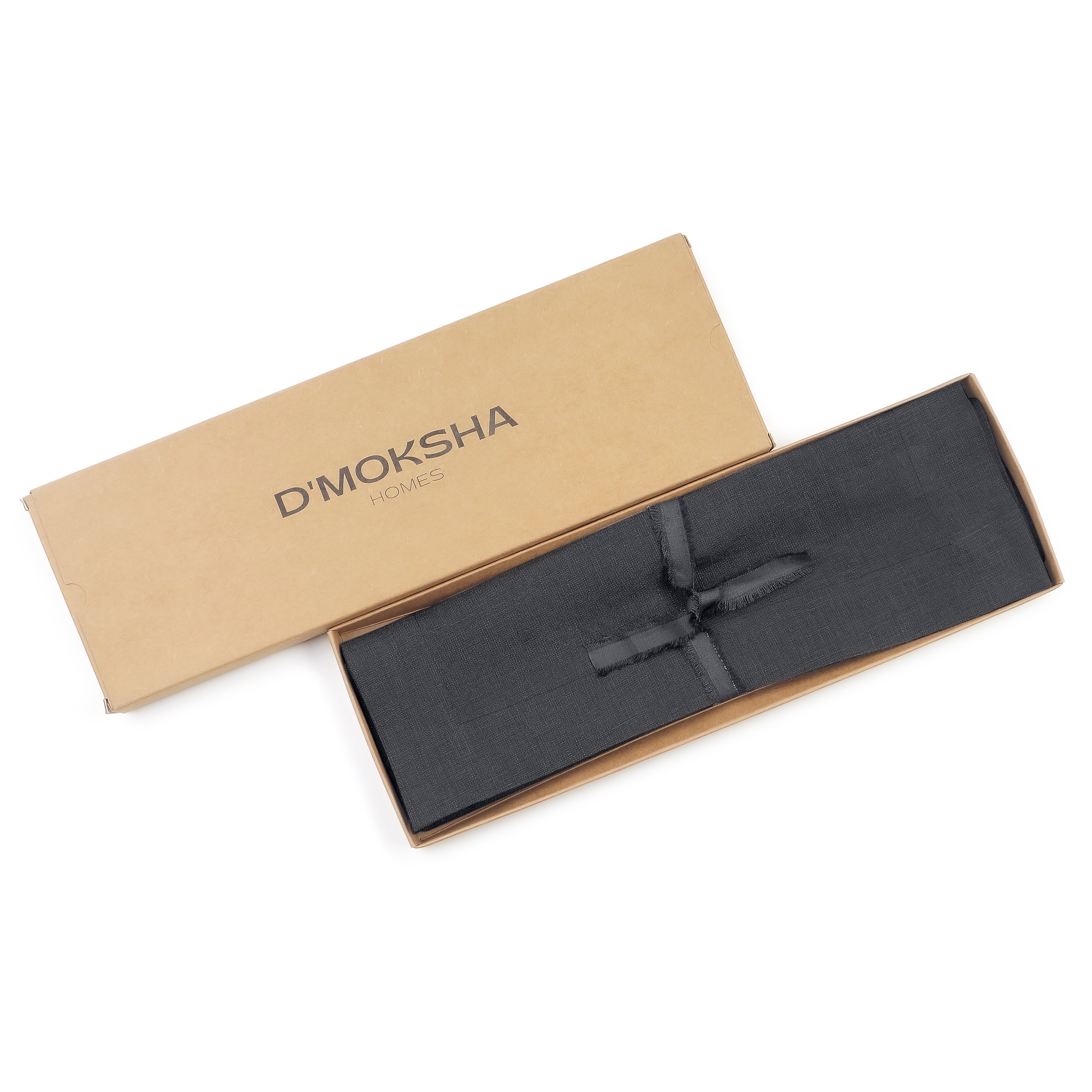 Charcoal grey linen placemats folded to show fabric texture