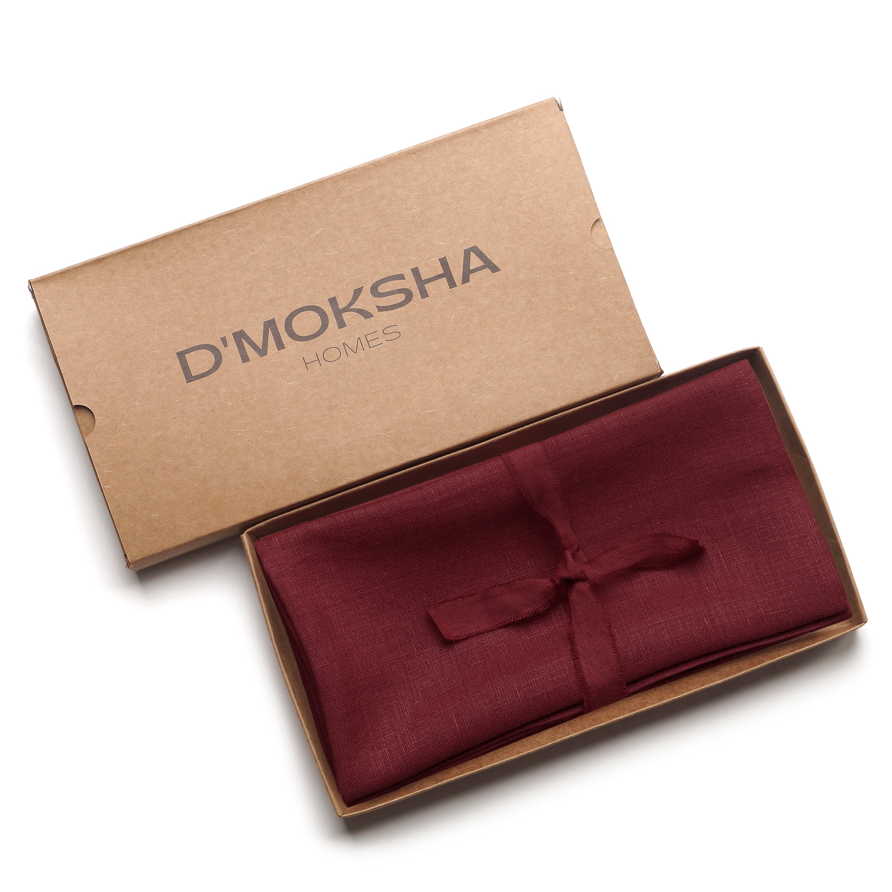 Close-up of the mitered corners on dark red pure linen dinner napkins