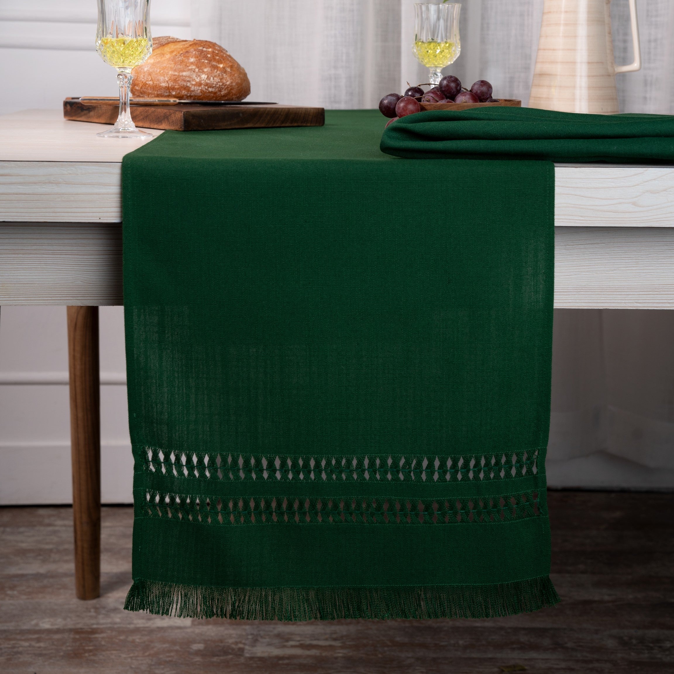 Eden green faux linen table runner styled on a dining table