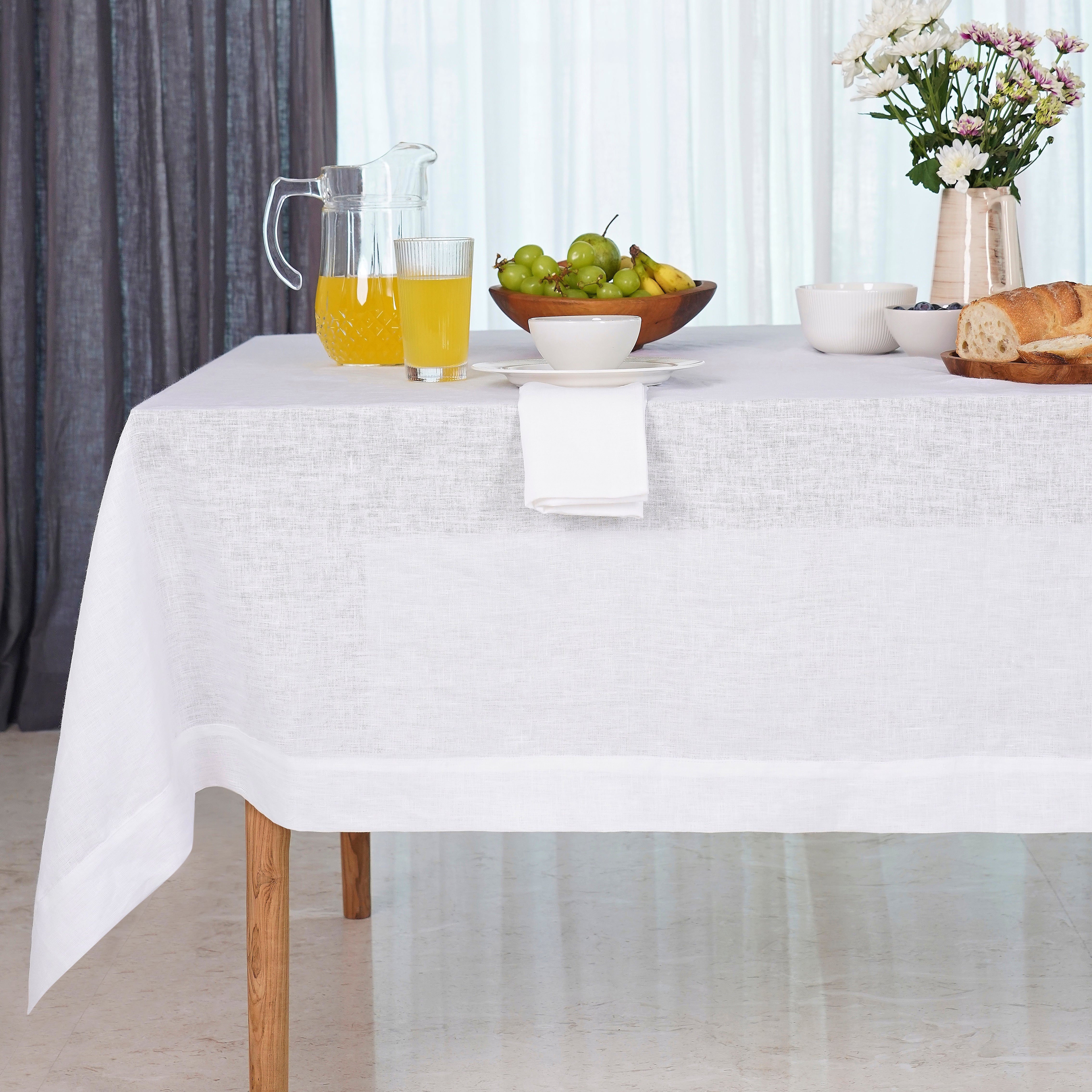 White linen tablecloth with hemmed edge, 52 x 52 inches