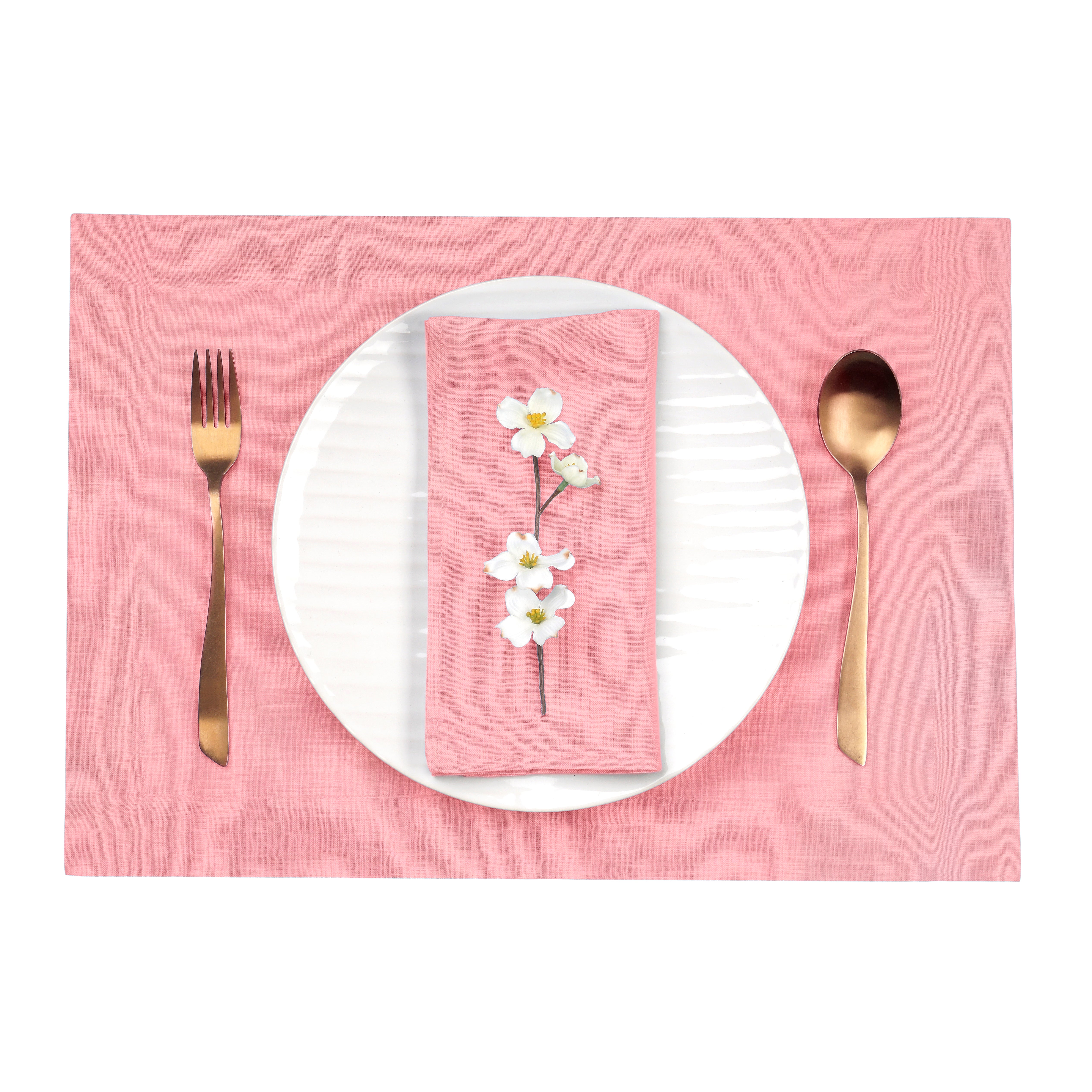 Close-up of the mitered corners on dusty pink pure linen placemats