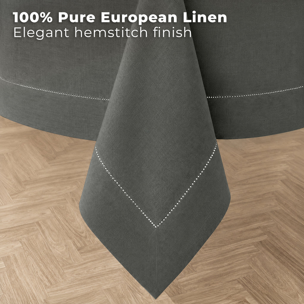 Charcoal grey pure linen tablecloth styled on a dining table