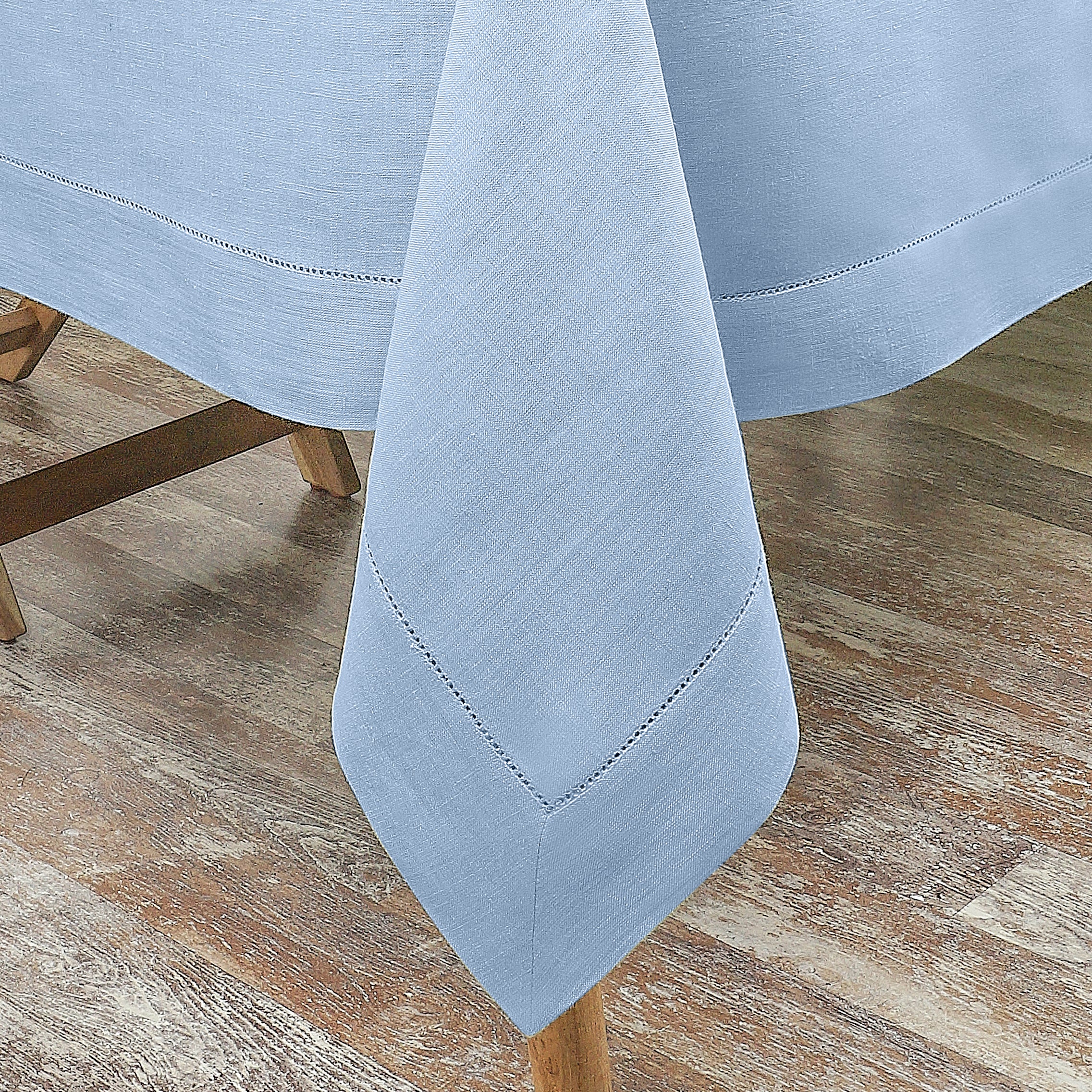 Powder blue pure linen tablecloth styled on a dining table