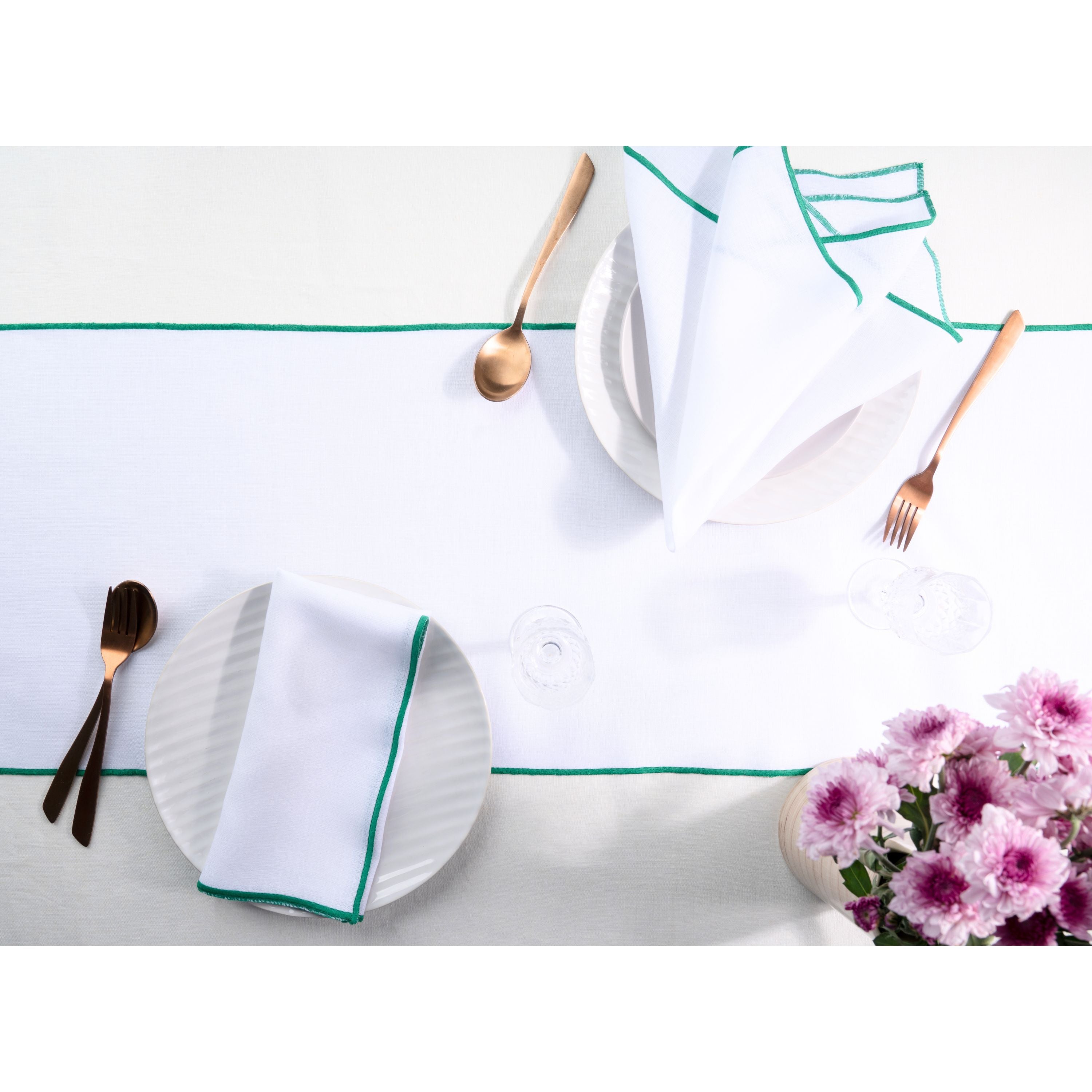 White and green pure linen table runner styled on a dining table