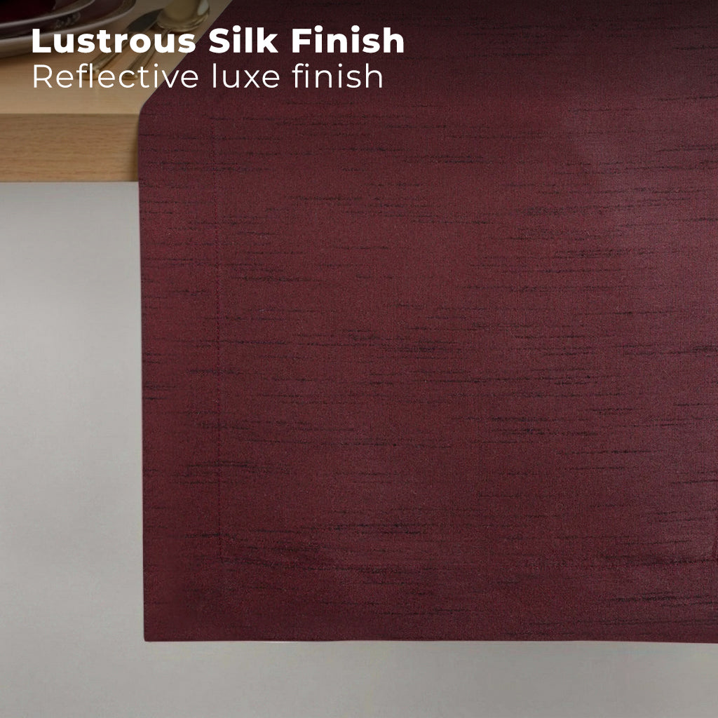 Wine red Luxe Shine table runner styled on a dining table