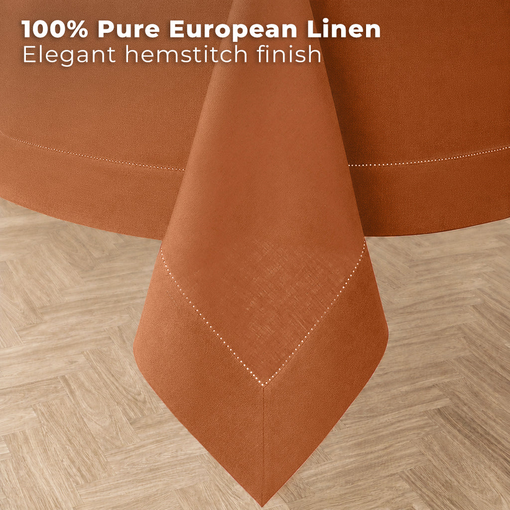 Rust pure linen tablecloth styled on a dining table