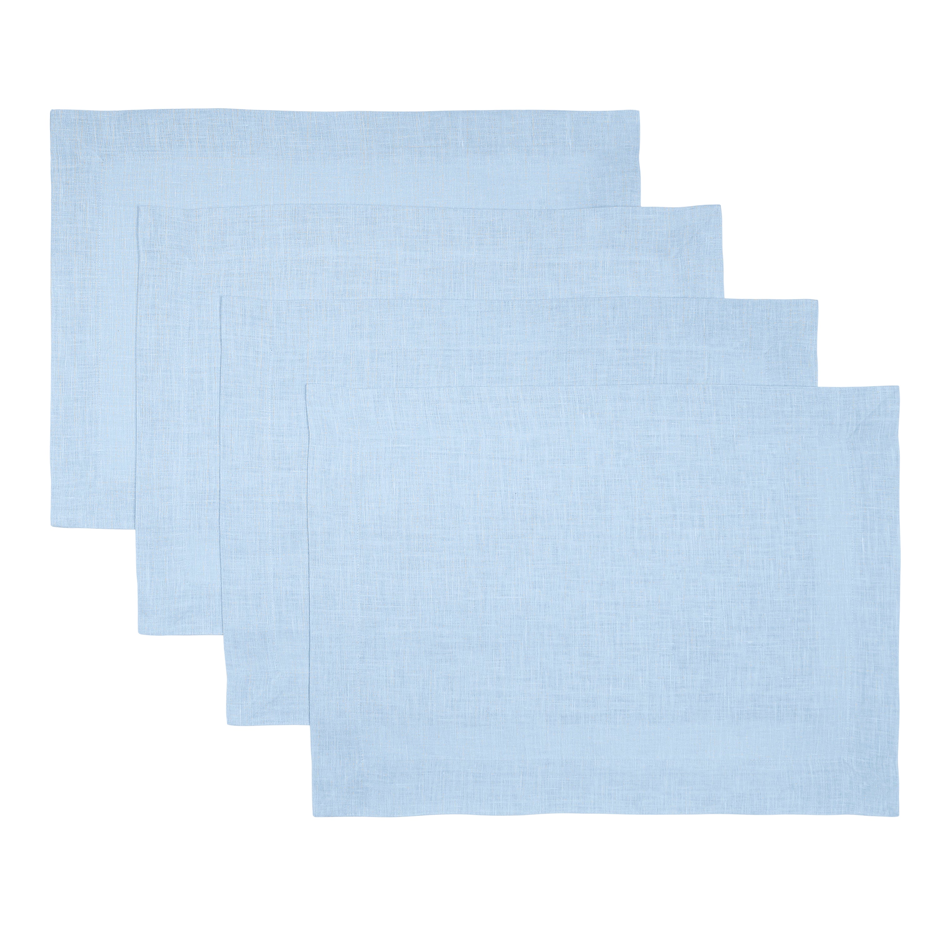 Powder blue pure linen placemats styled on a dining table
