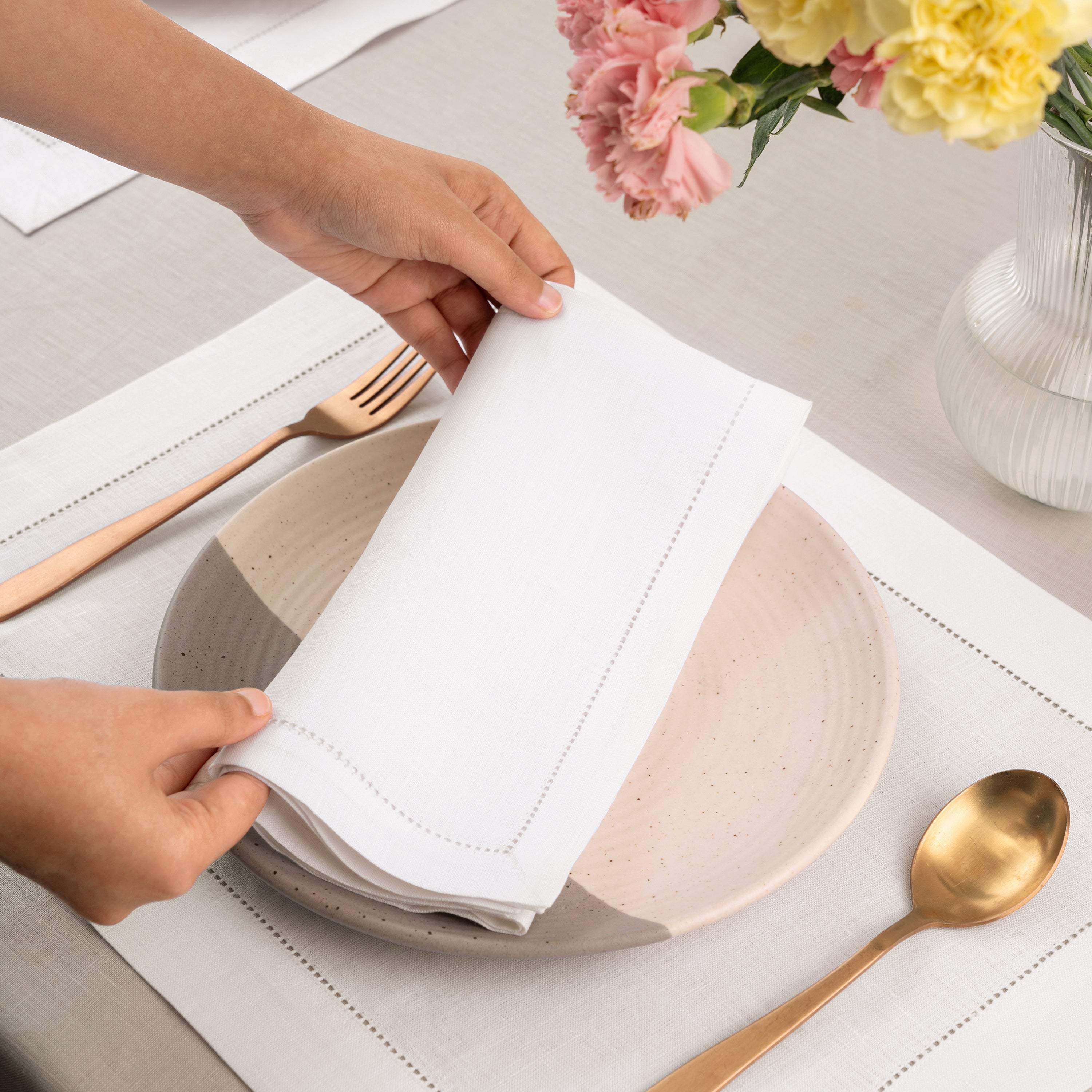 White pure linen dinner napkins with matching D'Moksha table linens