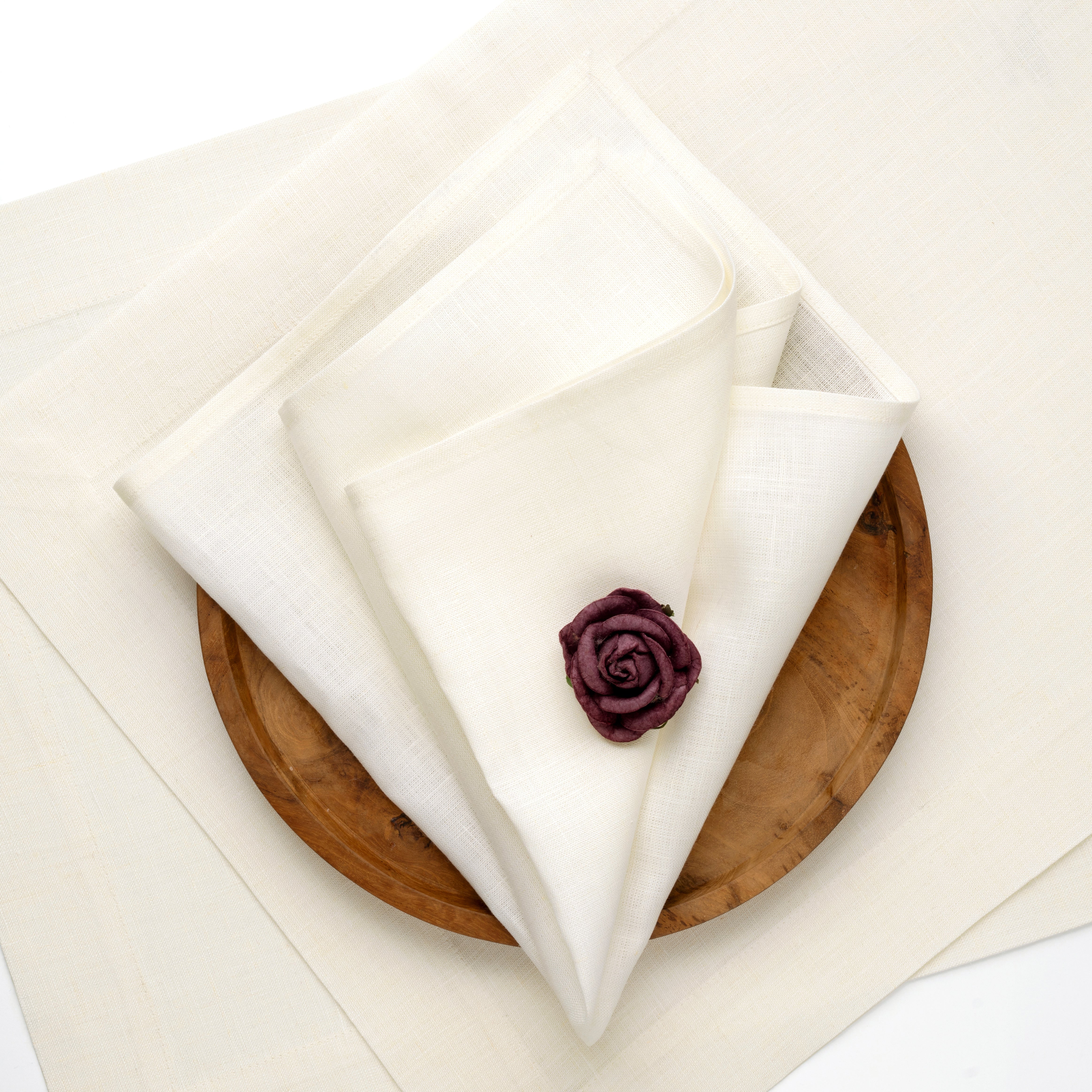 Ivory pure linen dinner napkins styled on a dining table