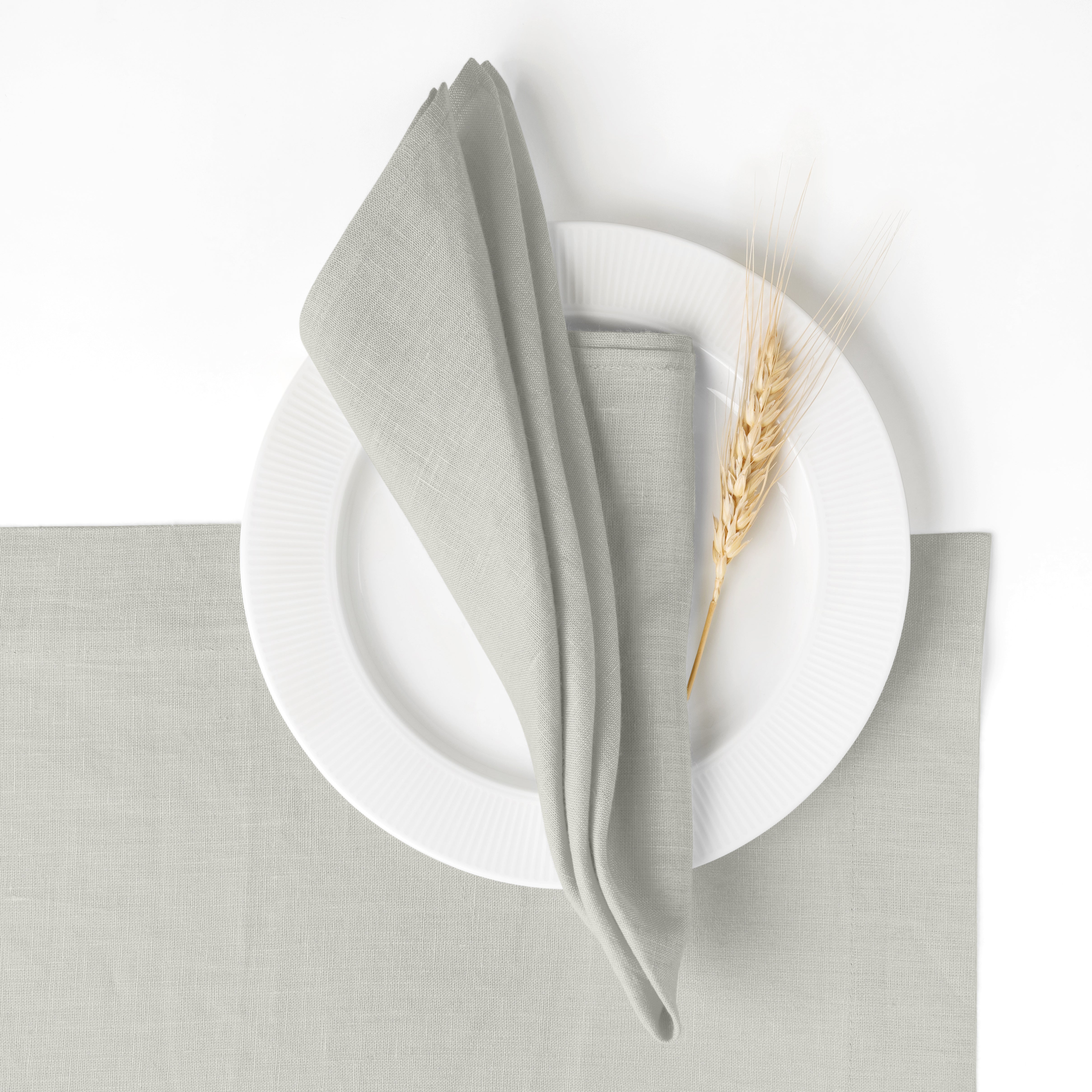 Silver grey pure linen dinner napkins styled on a dining table