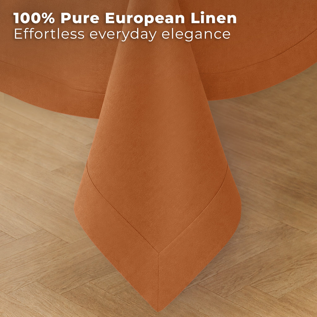 Rust pure linen tablecloth styled on a dining table