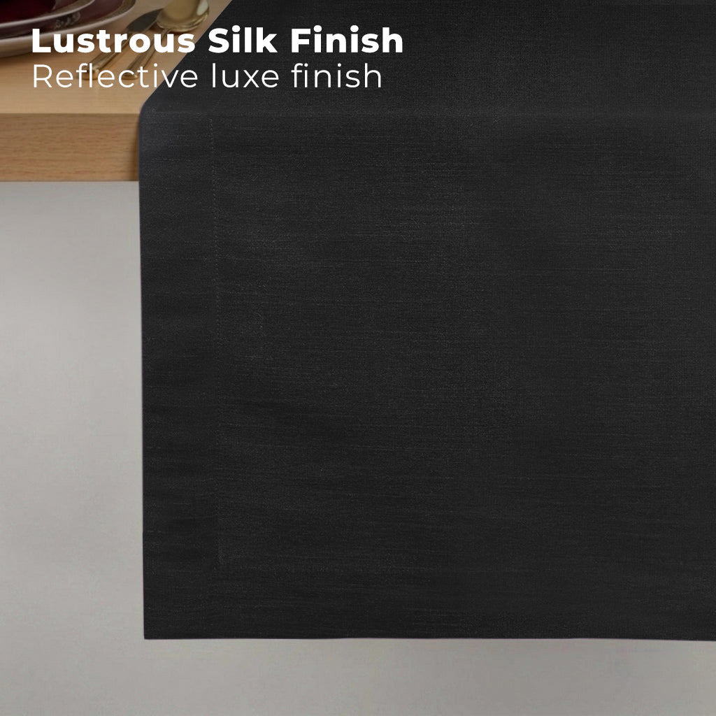 Black Luxe Shine table runner styled on a dining table