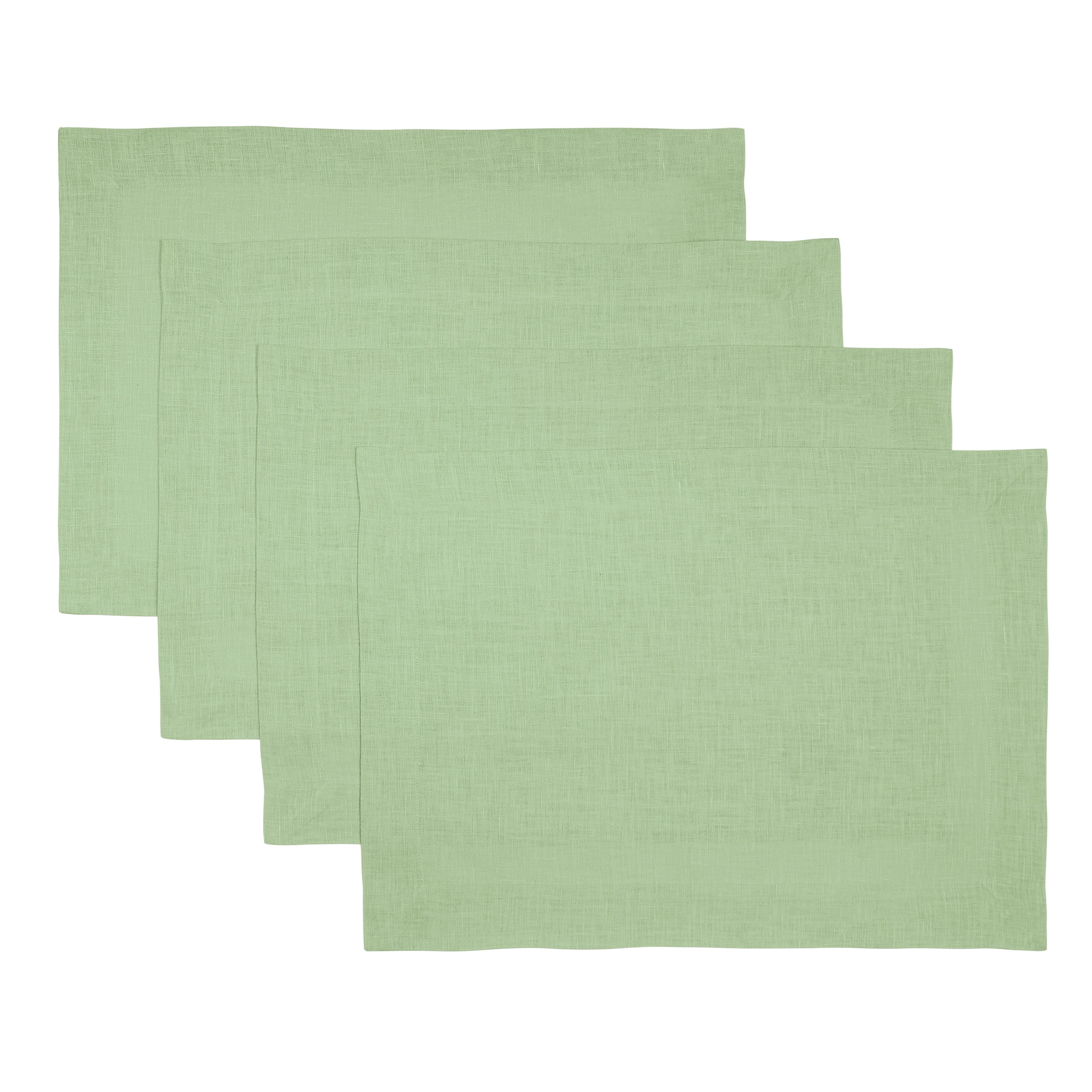 Sage green pure linen placemats styled on a dining table