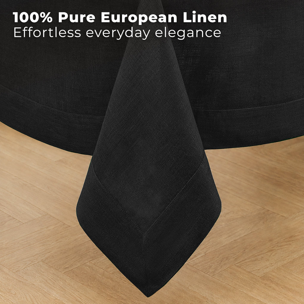 Black pure linen tablecloth styled on a dining table