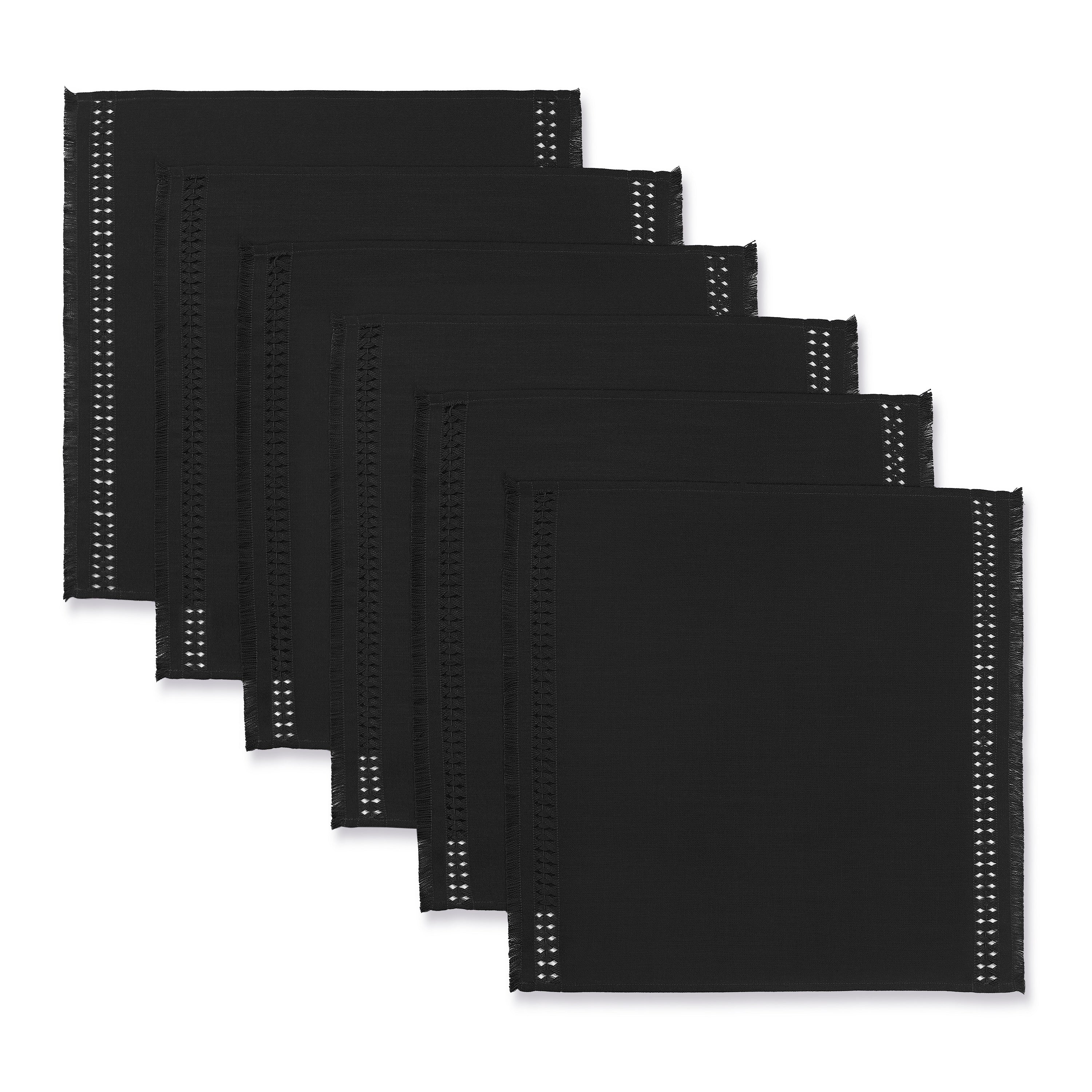 Black faux linen dinner napkins styled on a dining table