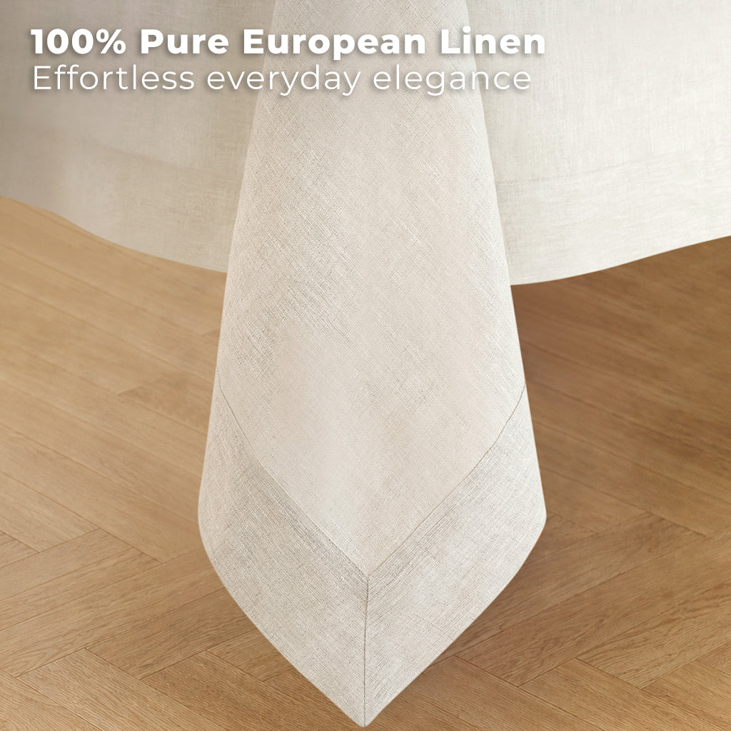 Light natural pure linen tablecloth styled on a dining table