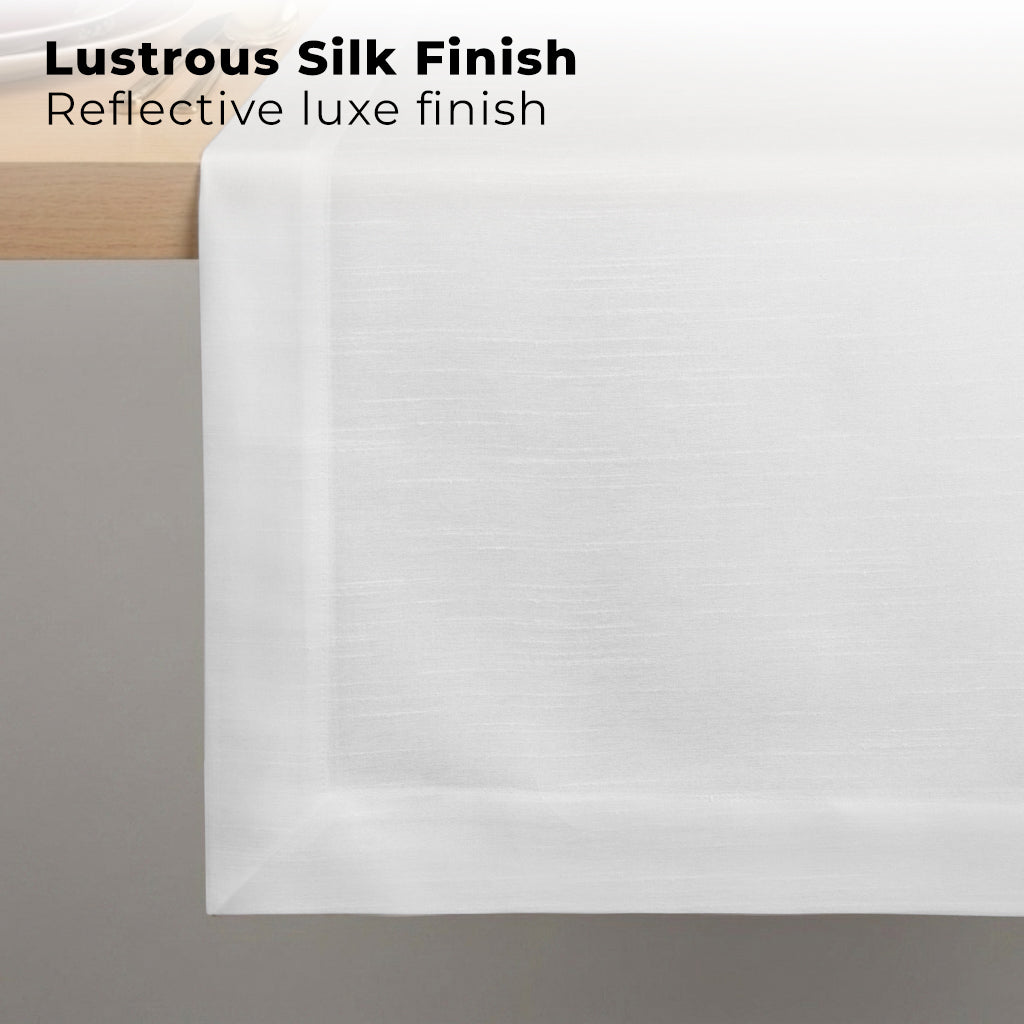 White Luxe Shine table runner styled on a dining table