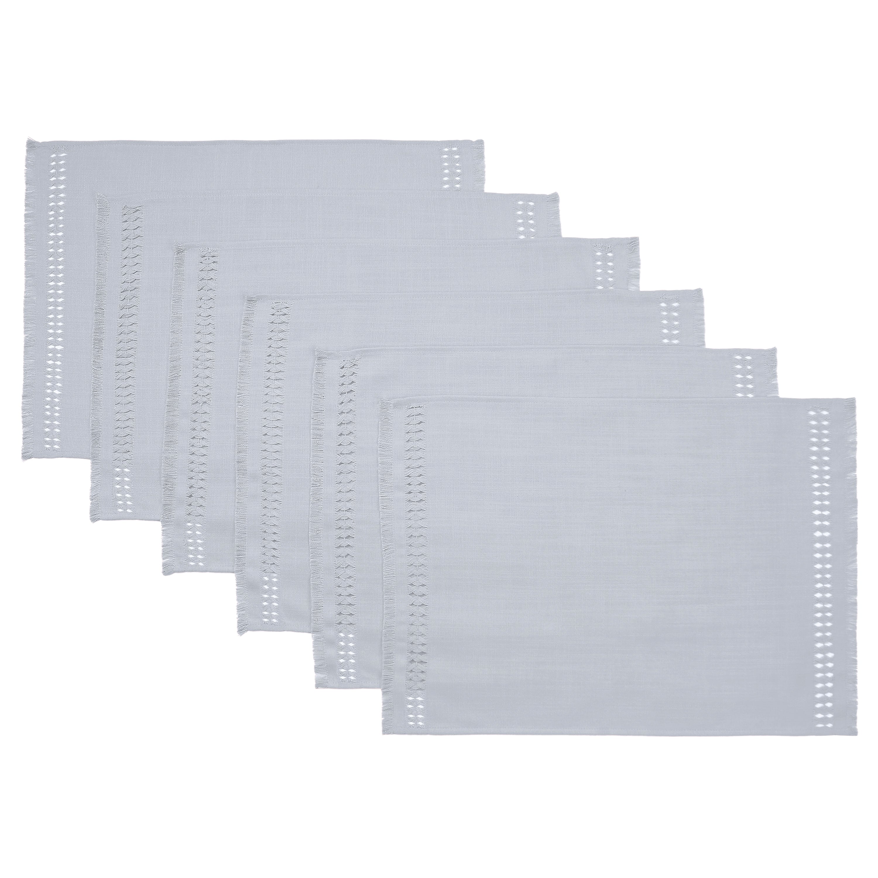 Light grey faux linen placemats styled on a dining table