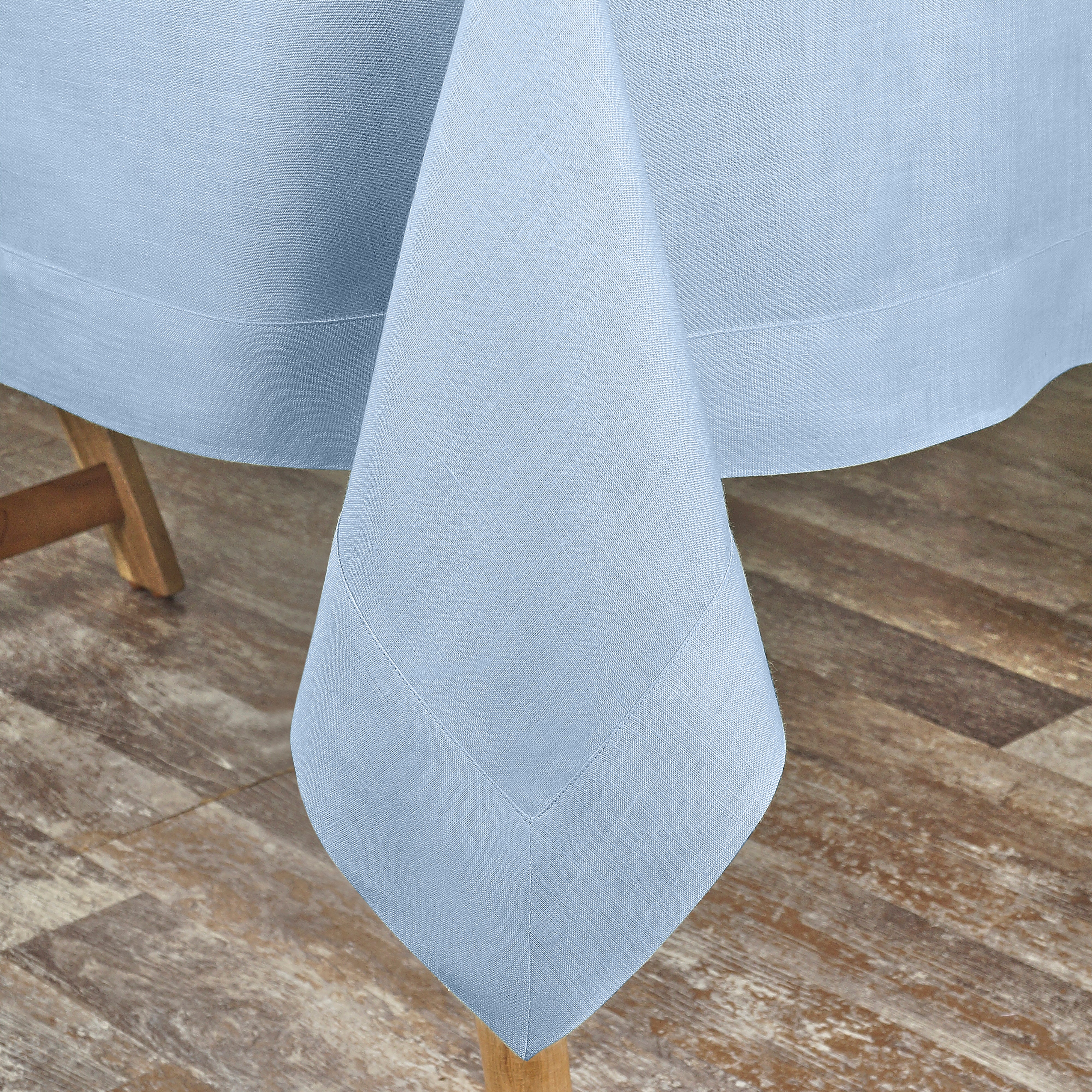 Powder blue pure linen tablecloth styled on a dining table