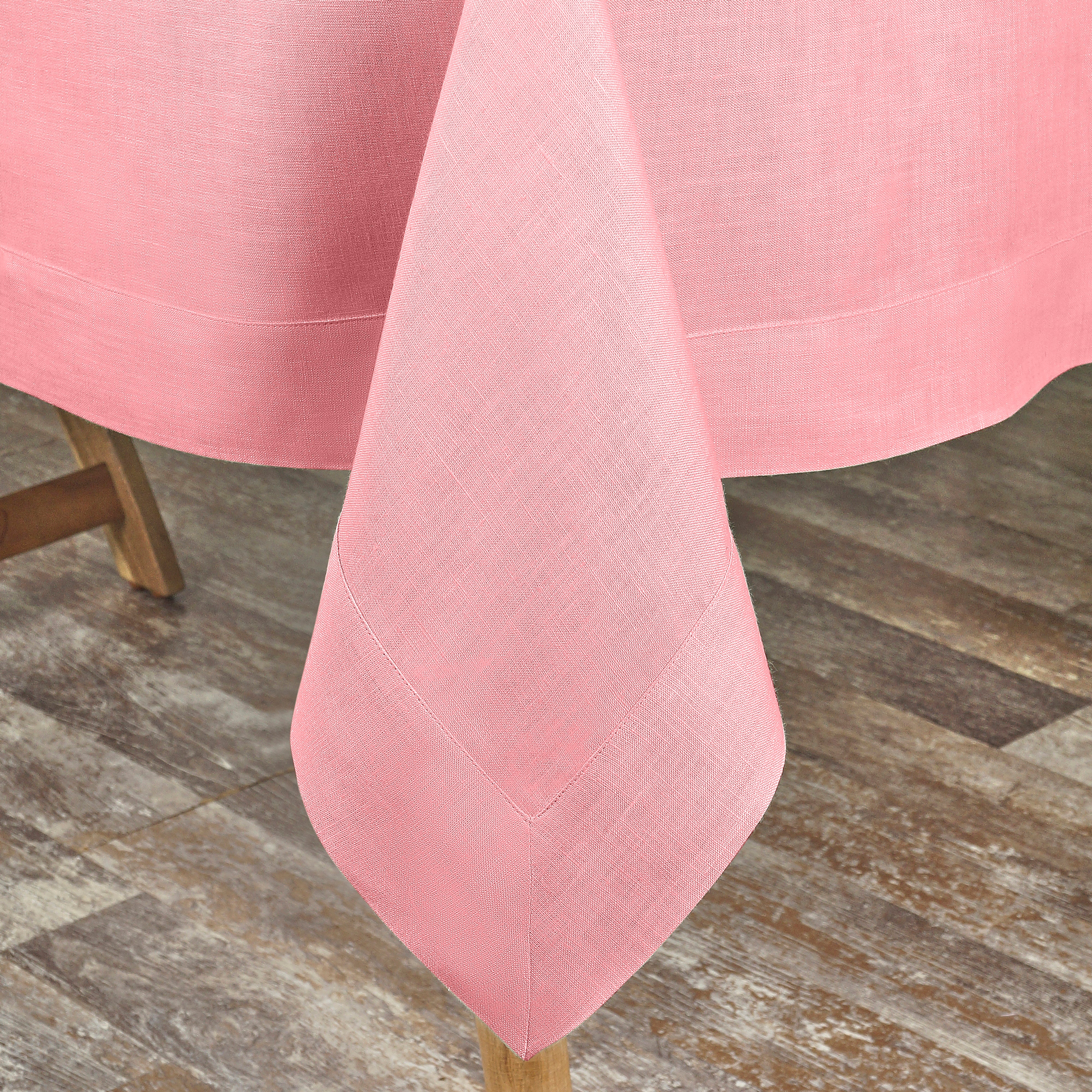 Dusty pink pure linen tablecloth styled on a dining table