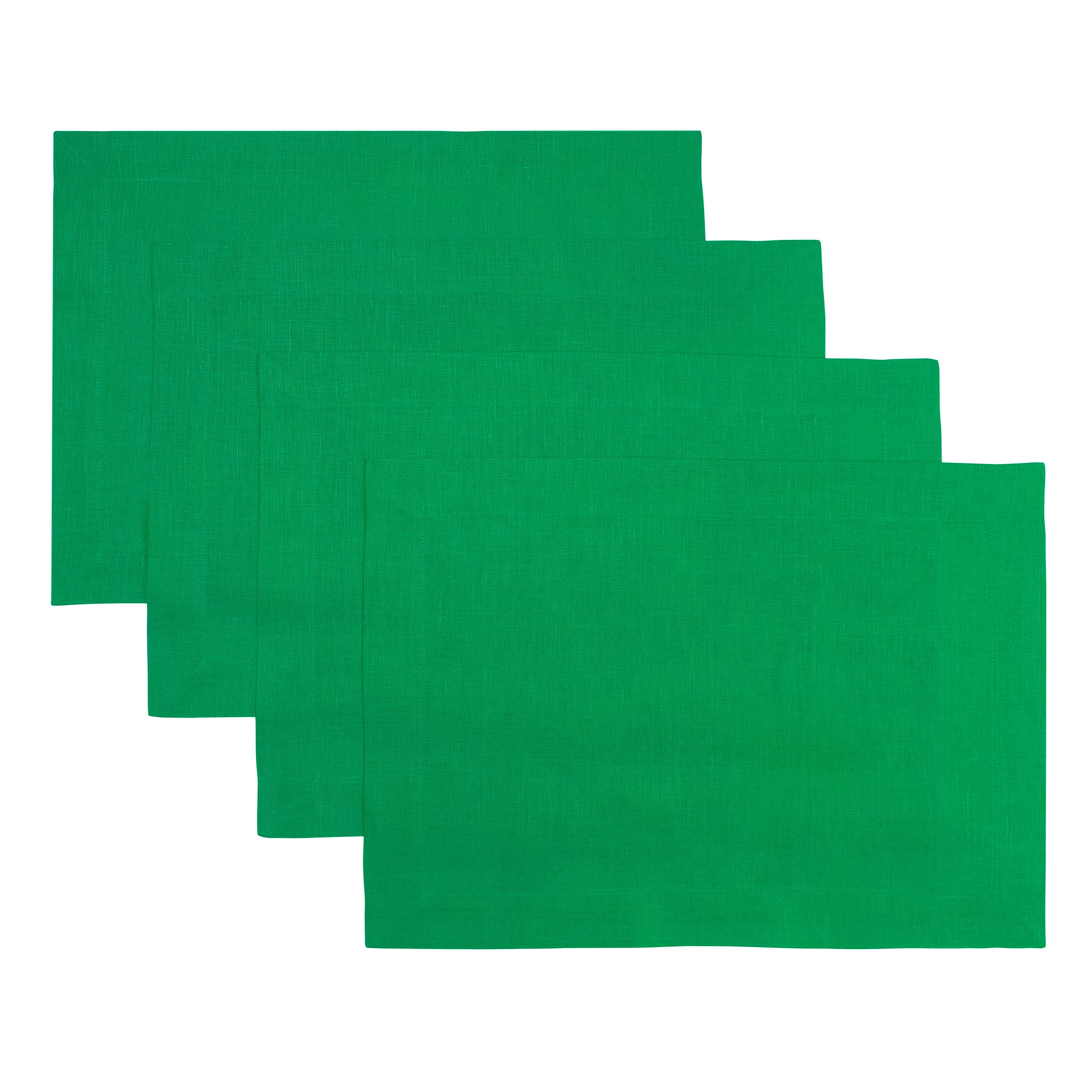 Kelly green pure linen placemats styled on a dining table