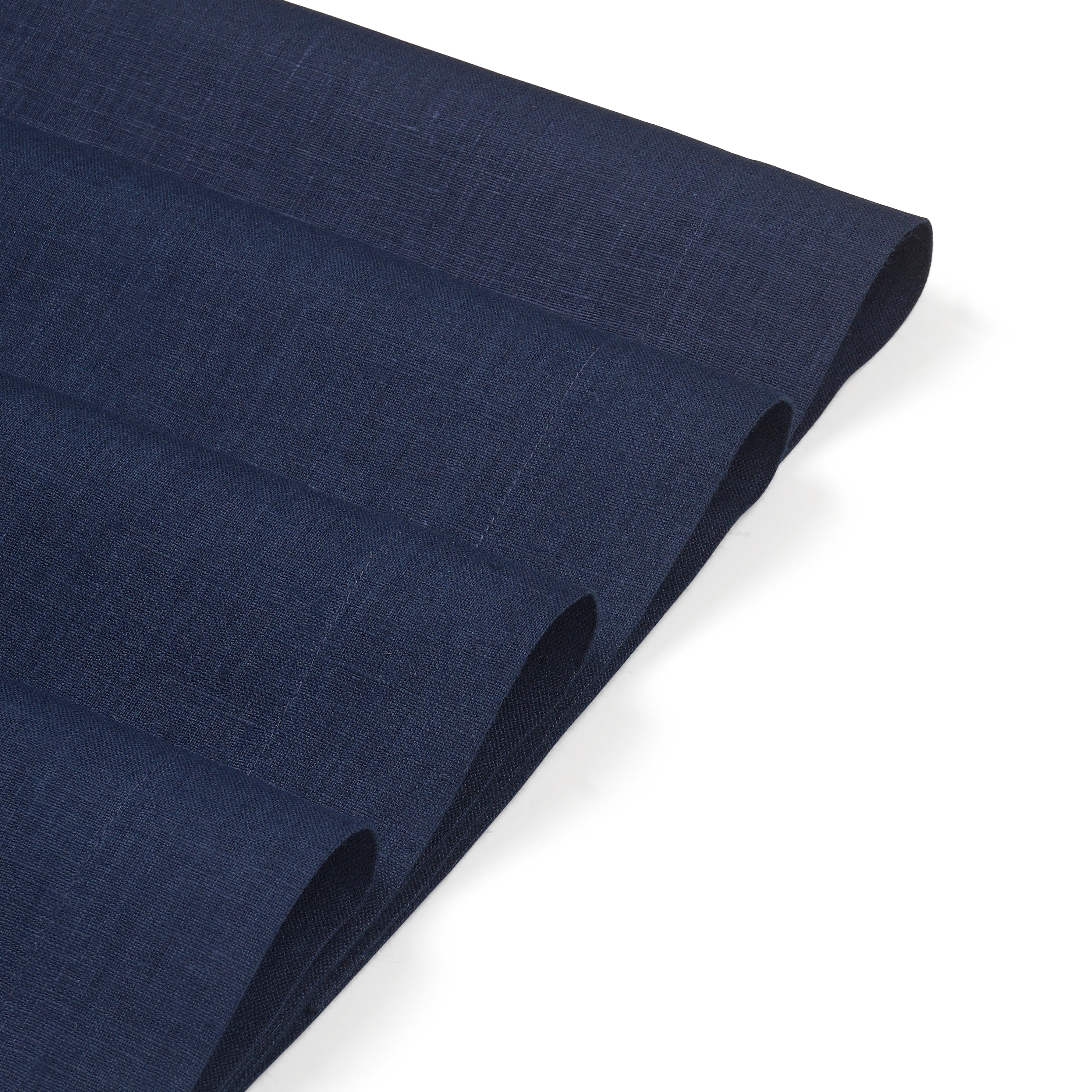 Navy blue linen placemats with matching D'Moksha table linens
