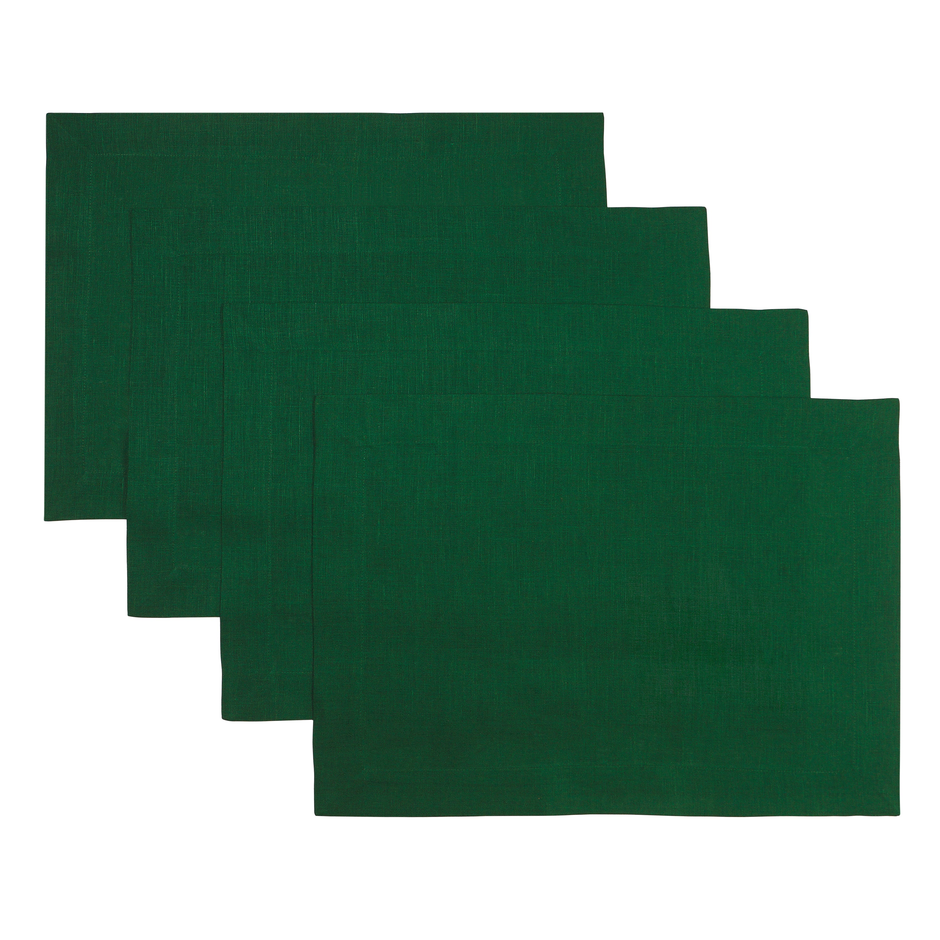 Forest green linen placemats styled on a dining table