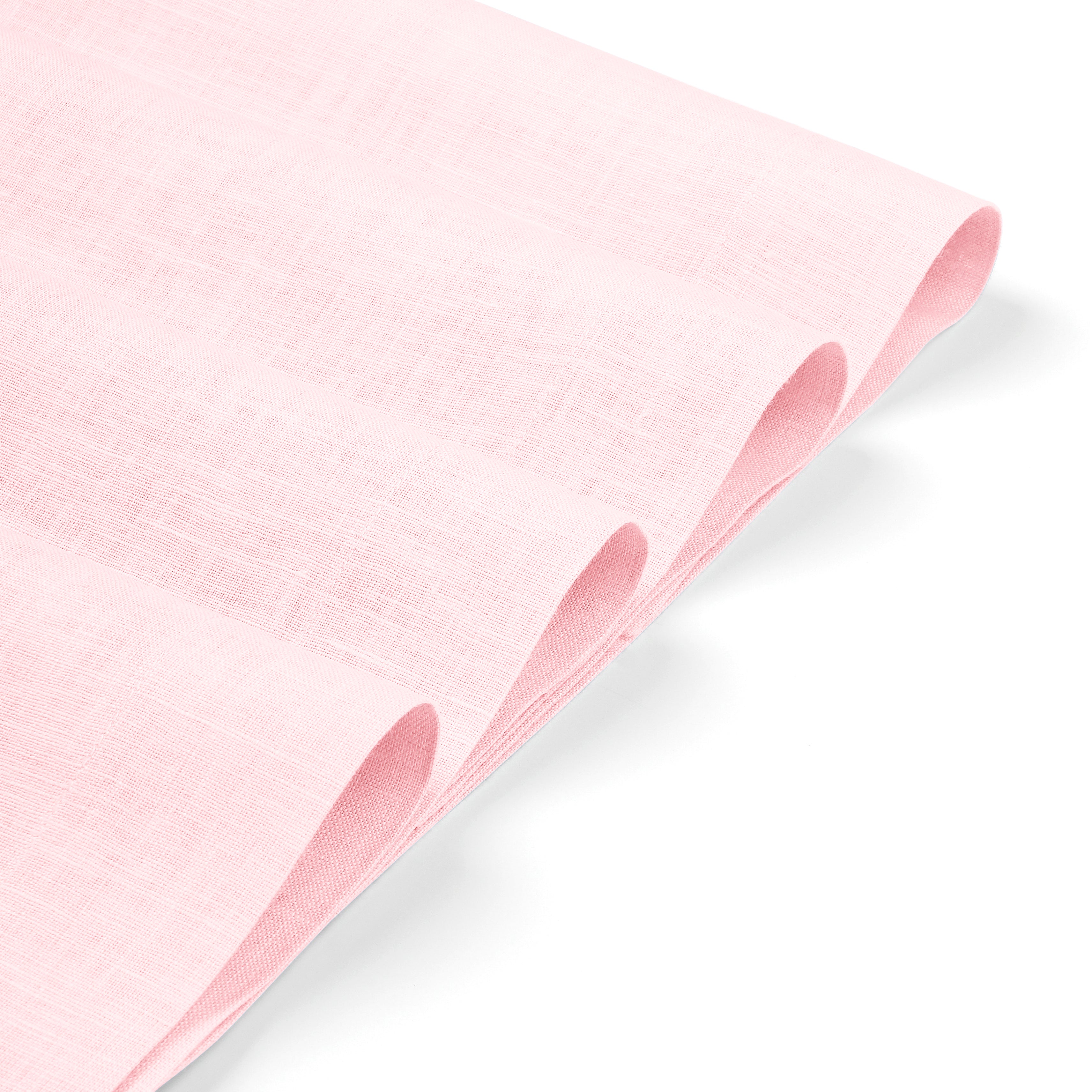 Pastel pink linen placemats with matching D'Moksha table linens
