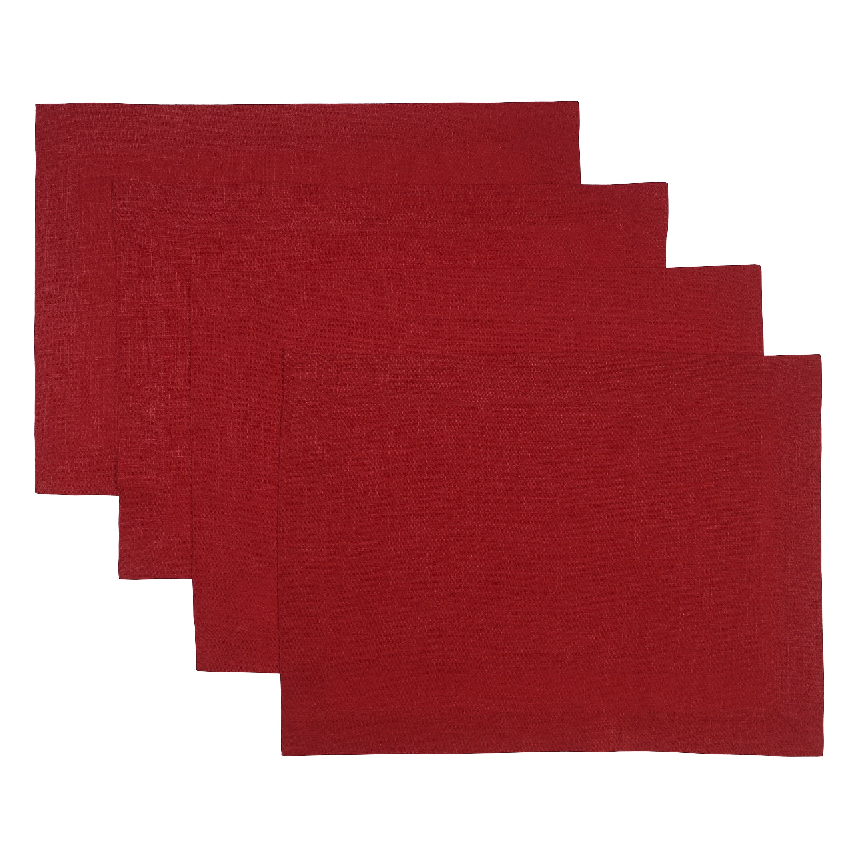 Red linen placemats styled on a dining table