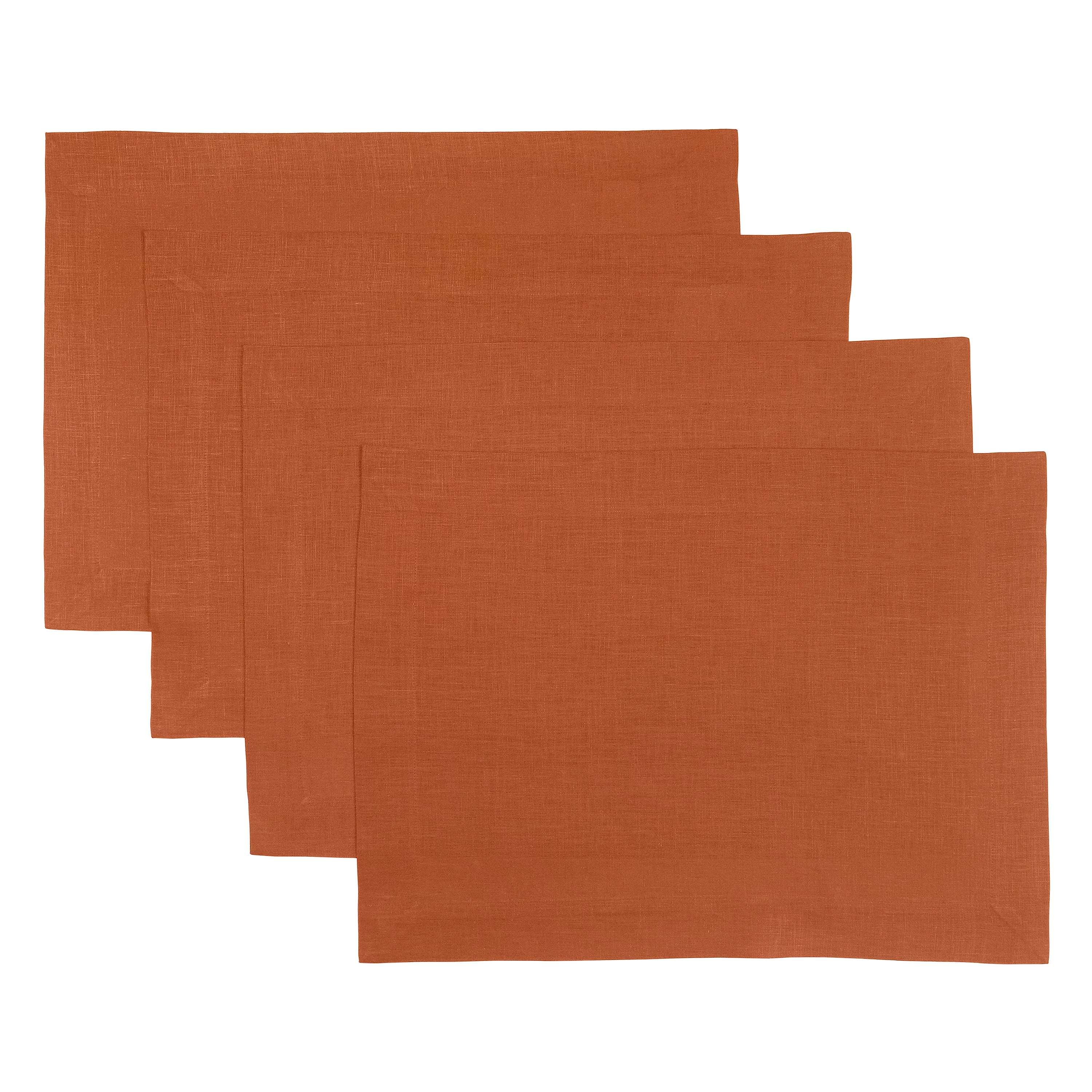 Rust linen placemats styled on a dining table