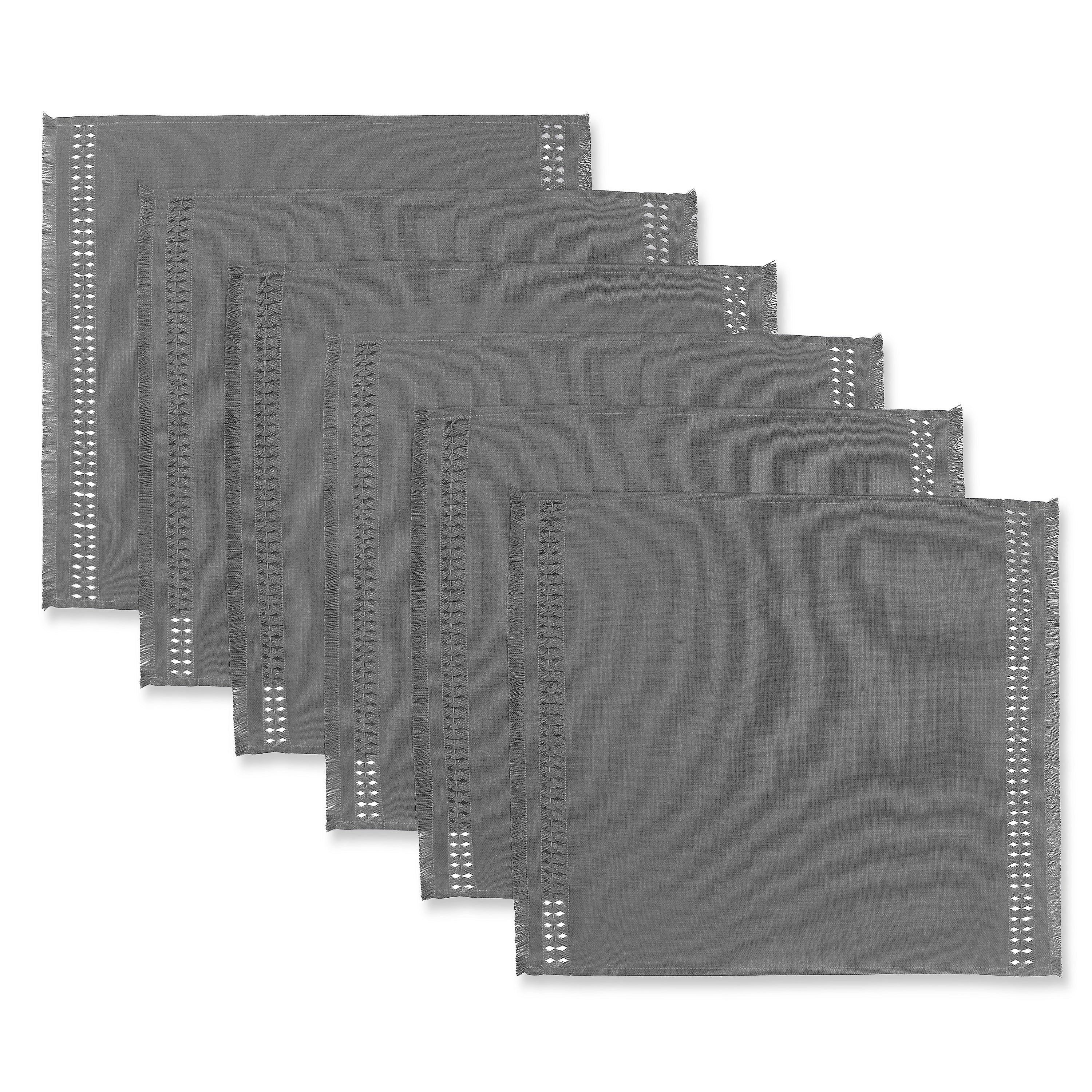 Charcoal grey faux linen dinner napkins styled on a dining table