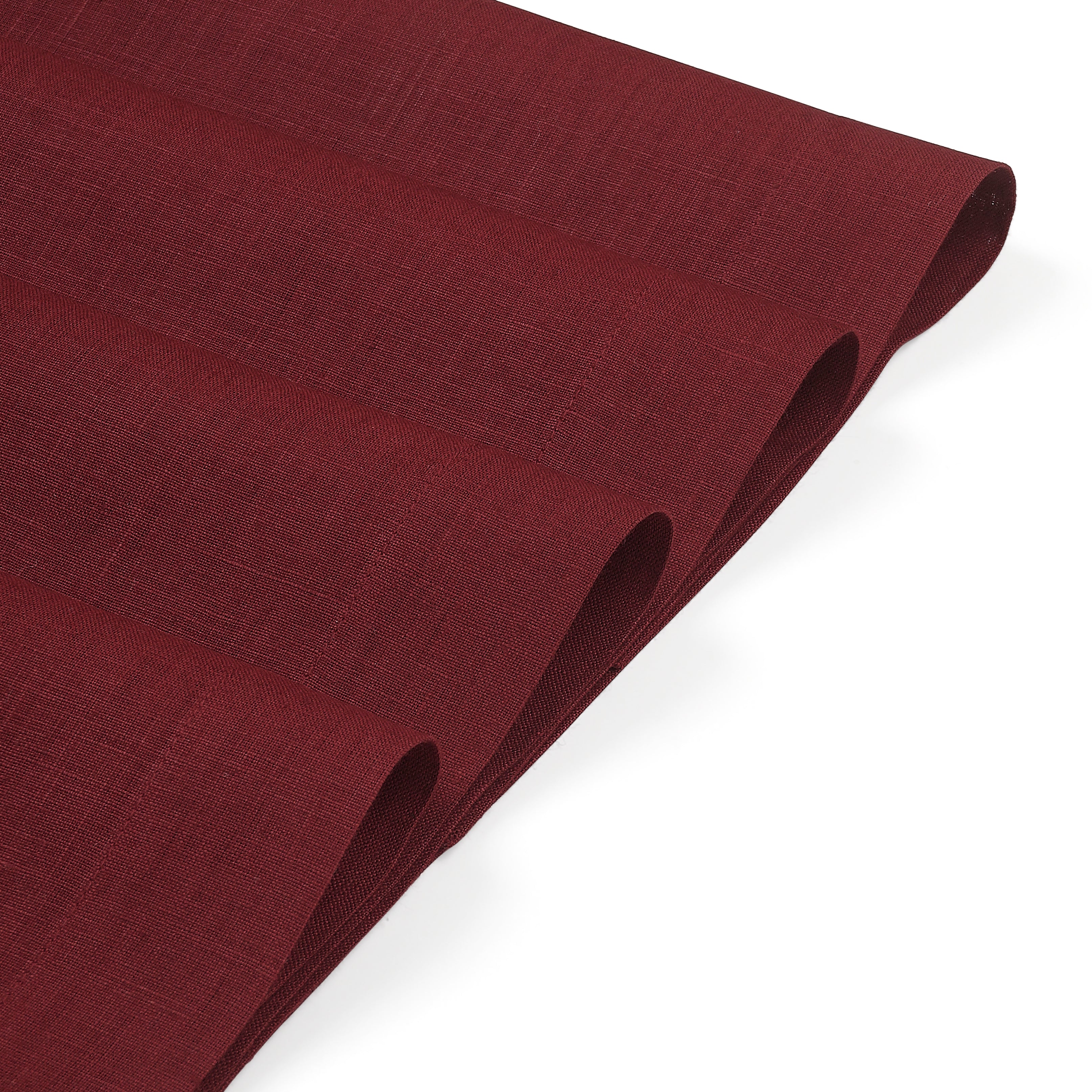 Dark red linen placemats with matching D'Moksha table linens
