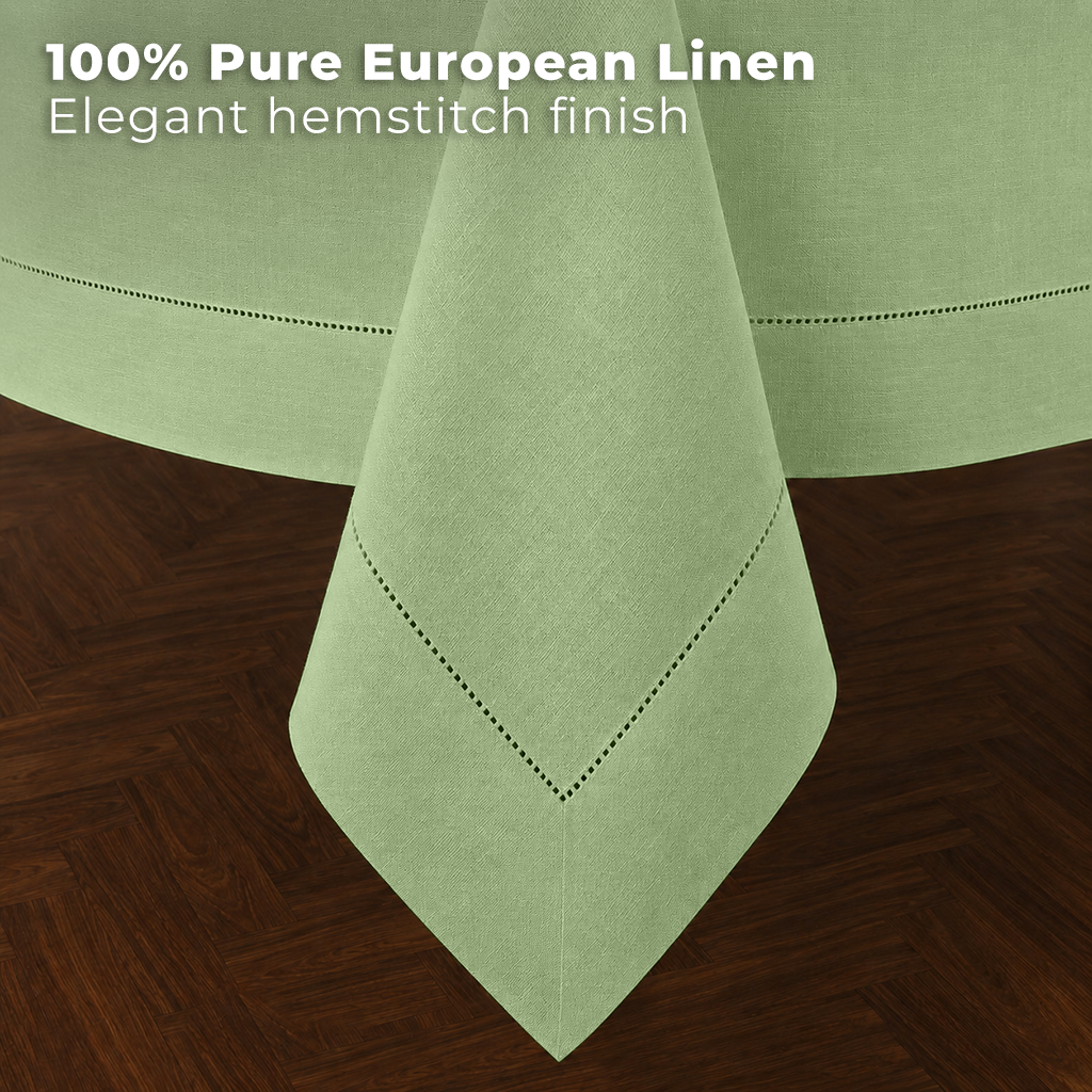 Sage green pure linen tablecloth styled on a dining table