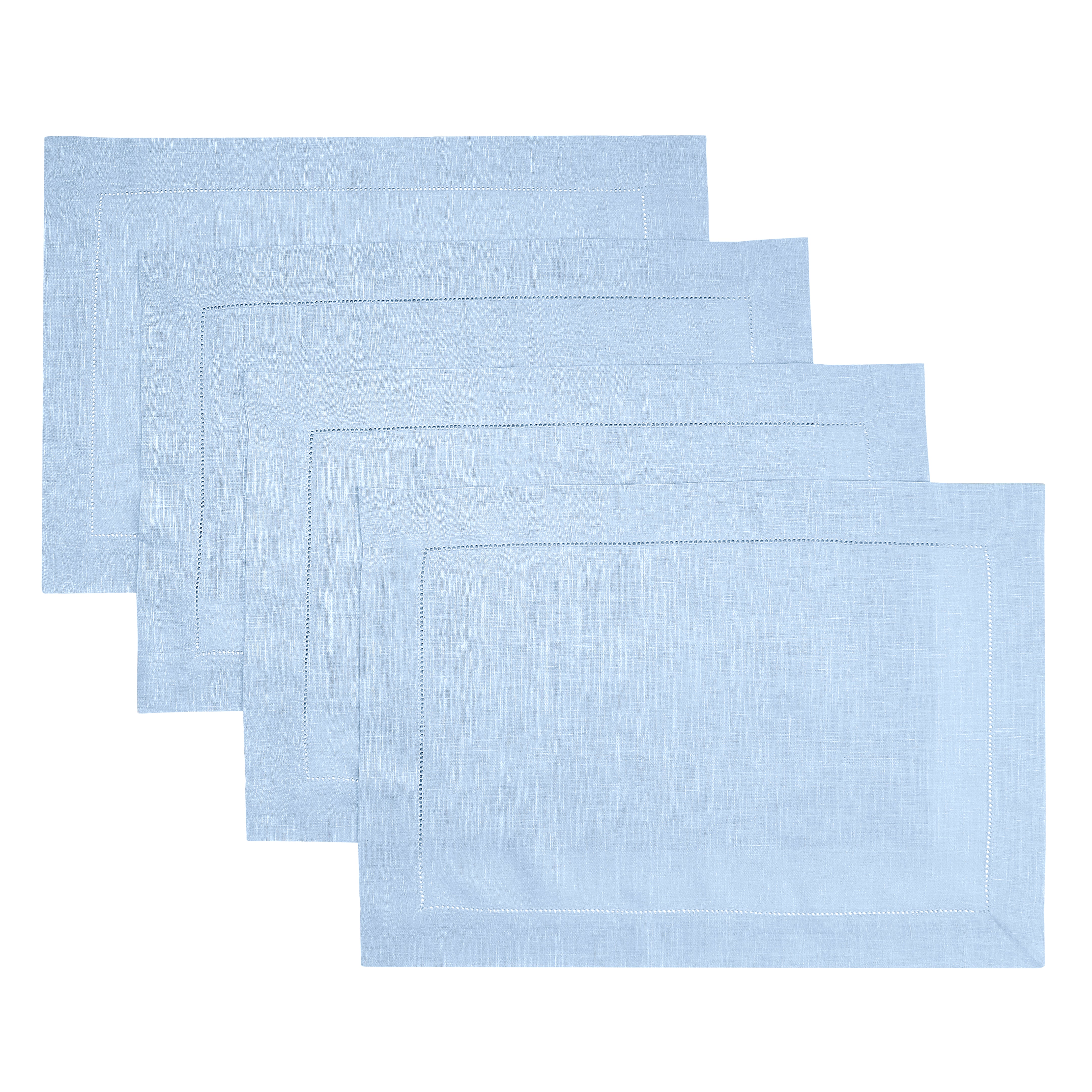 Powder blue pure linen placemats styled on a dining table