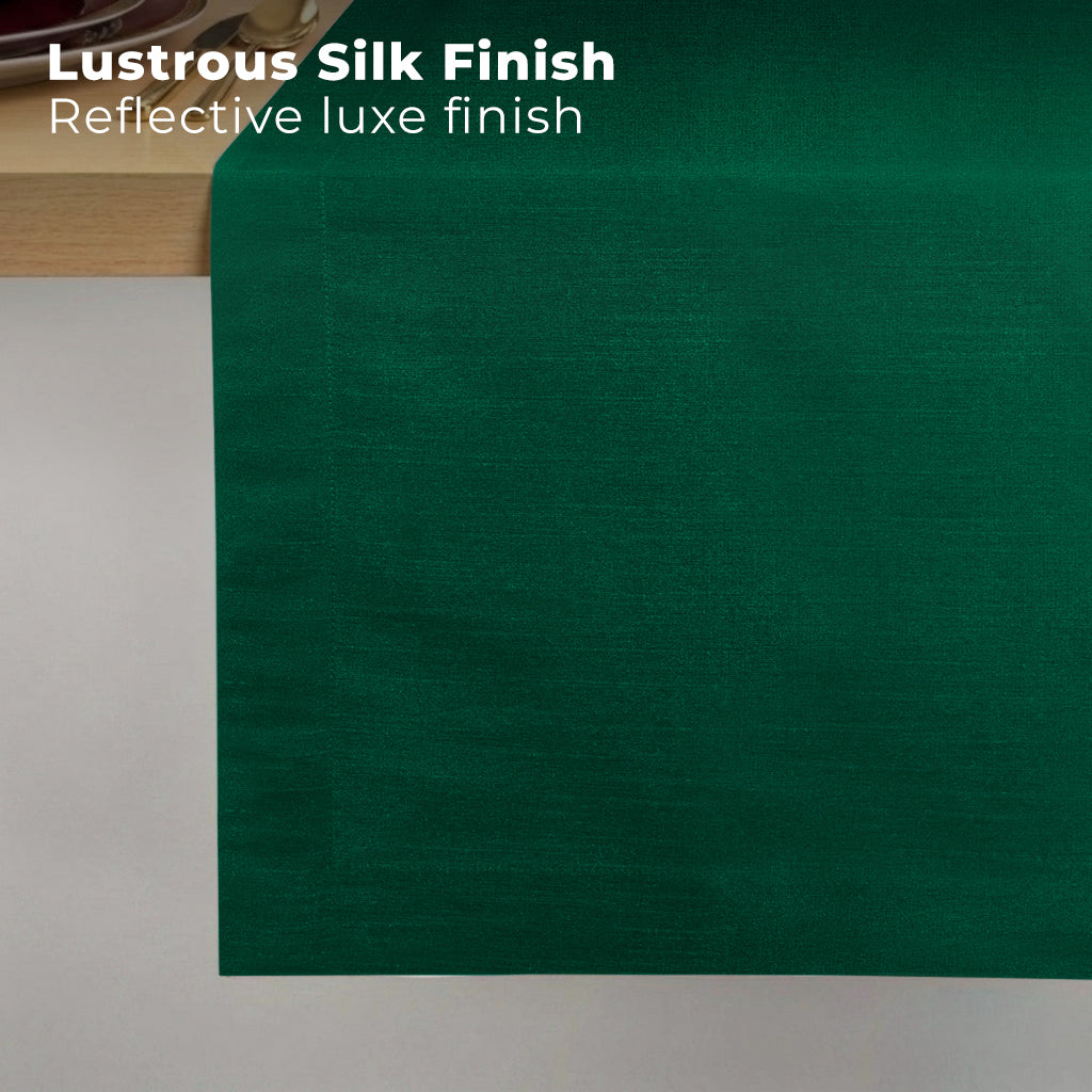 Emerald green Luxe Shine table runner styled on a dining table