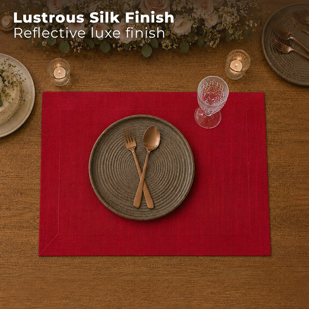 Red Luxe Shine placemats styled on a dining table