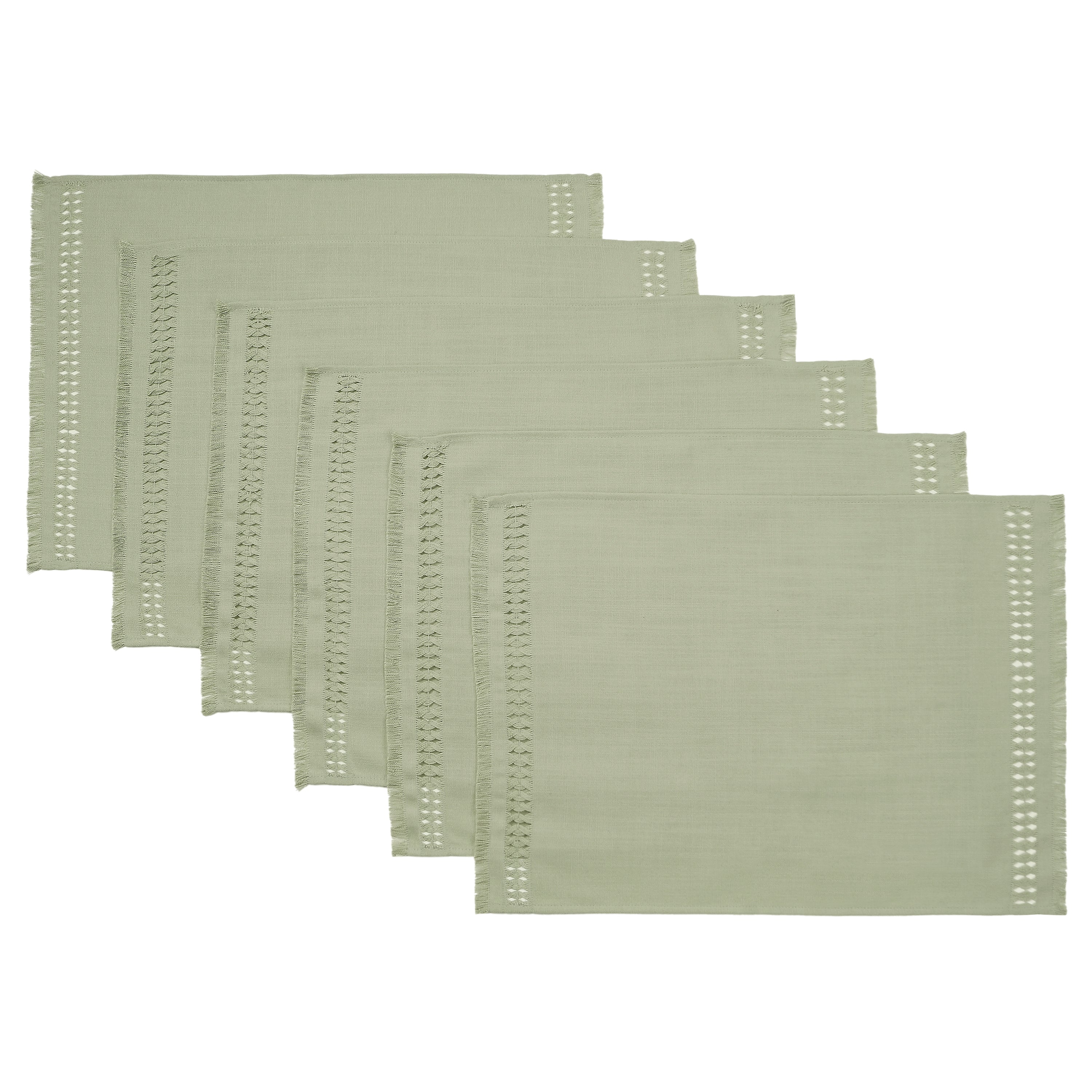 Sage green faux linen placemats styled on a dining table