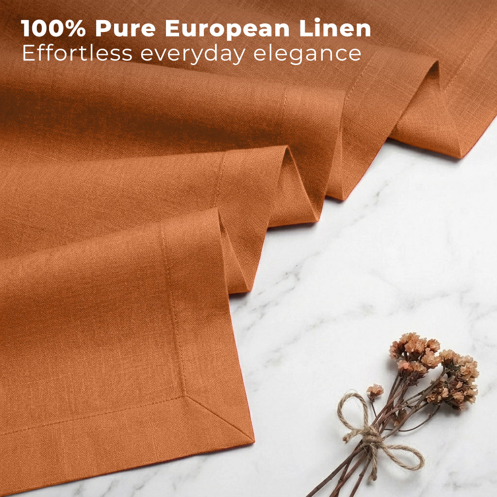 Rust pure linen table runner styled on a dining table