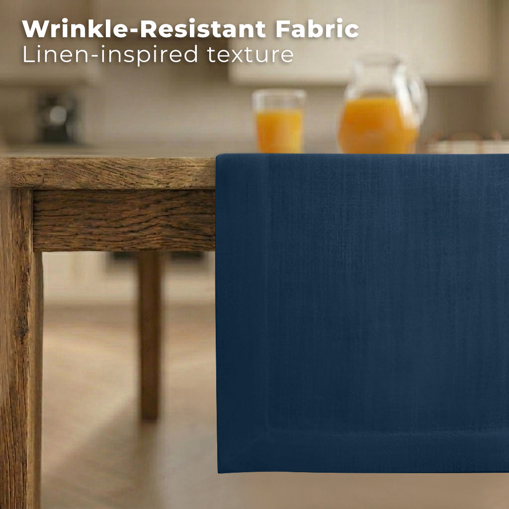 Navy blue faux linen table runner styled on a dining table
