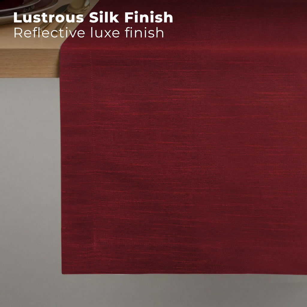 Red Luxe Shine table runner styled on a dining table