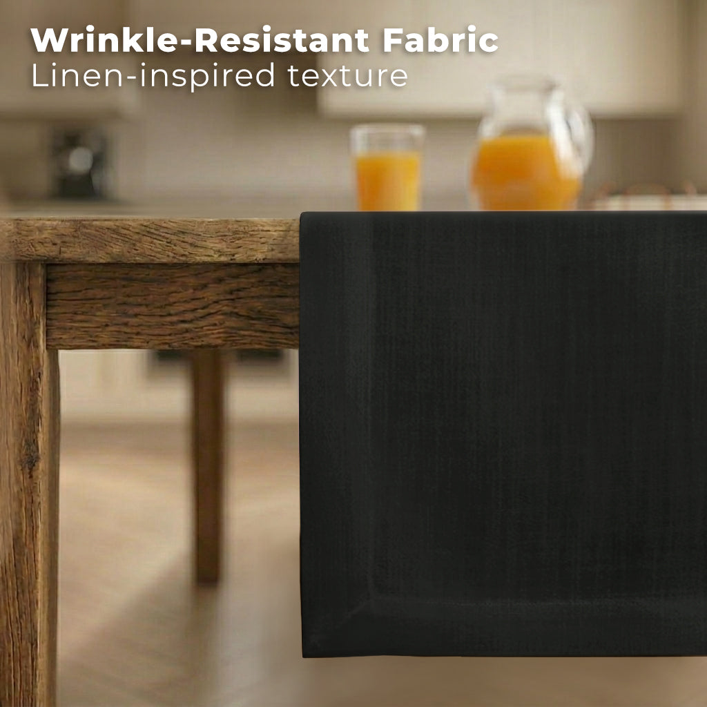 Black faux linen table runner styled on a dining table