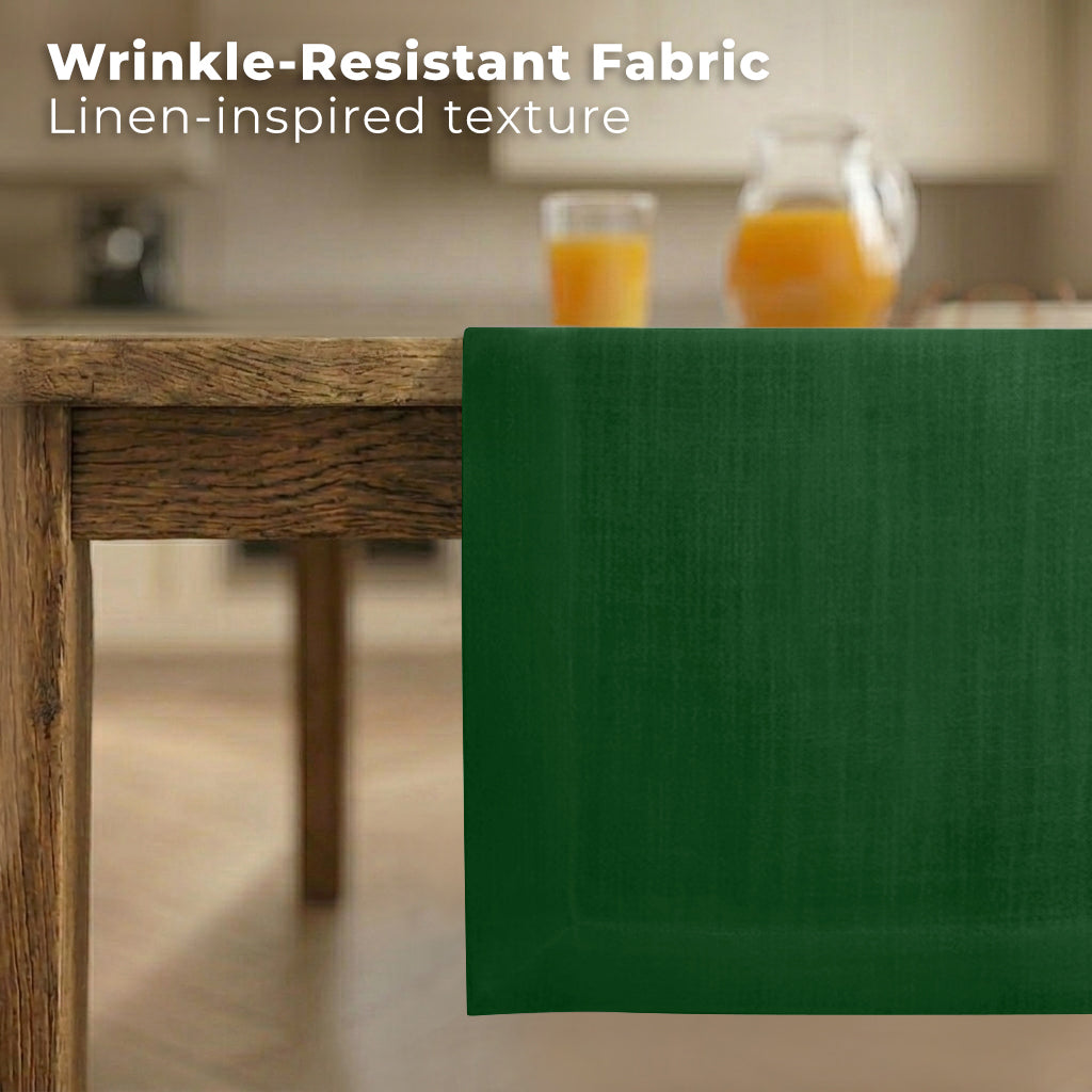 Forest green faux linen table runner styled on a dining table