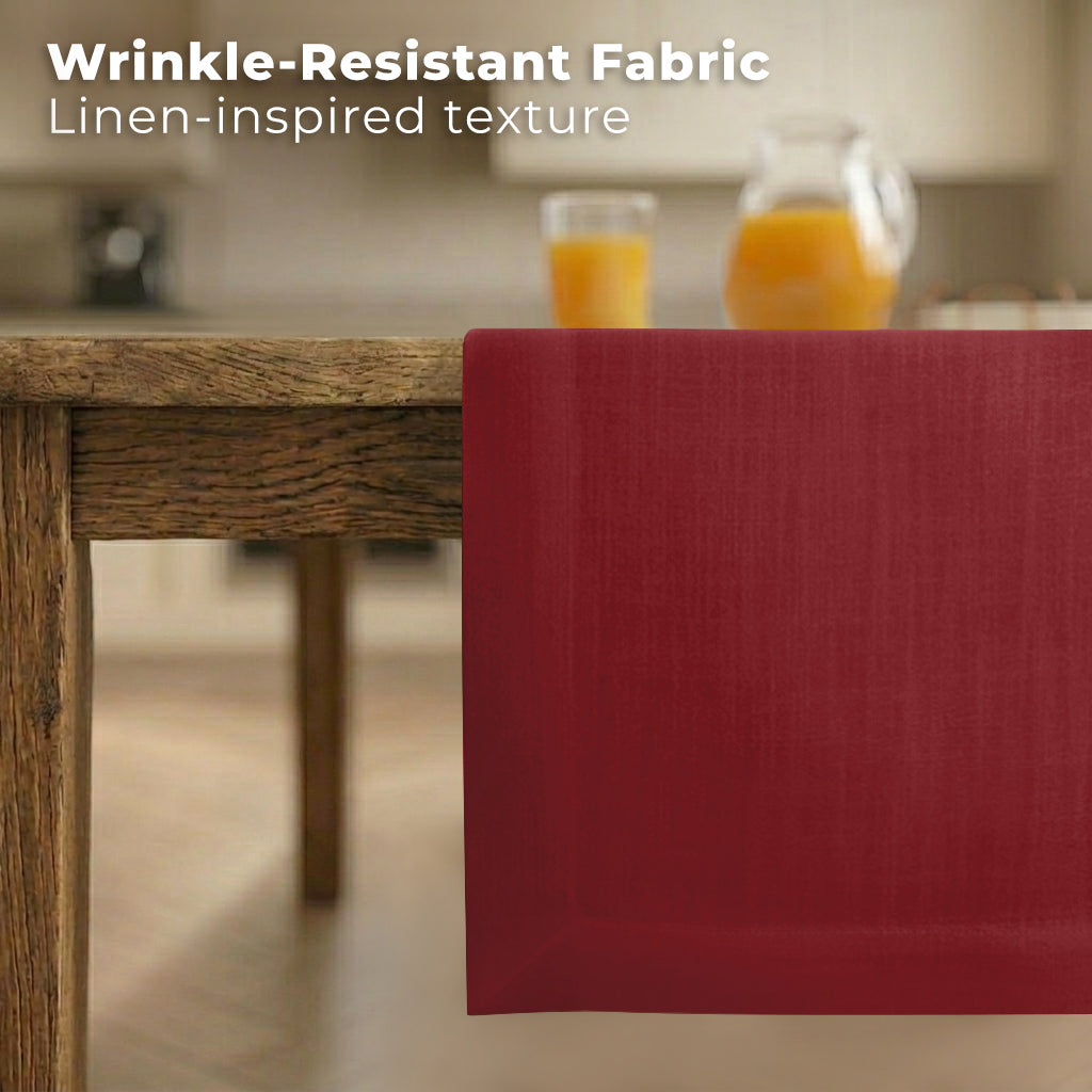 Red faux linen table runner styled on a dining table