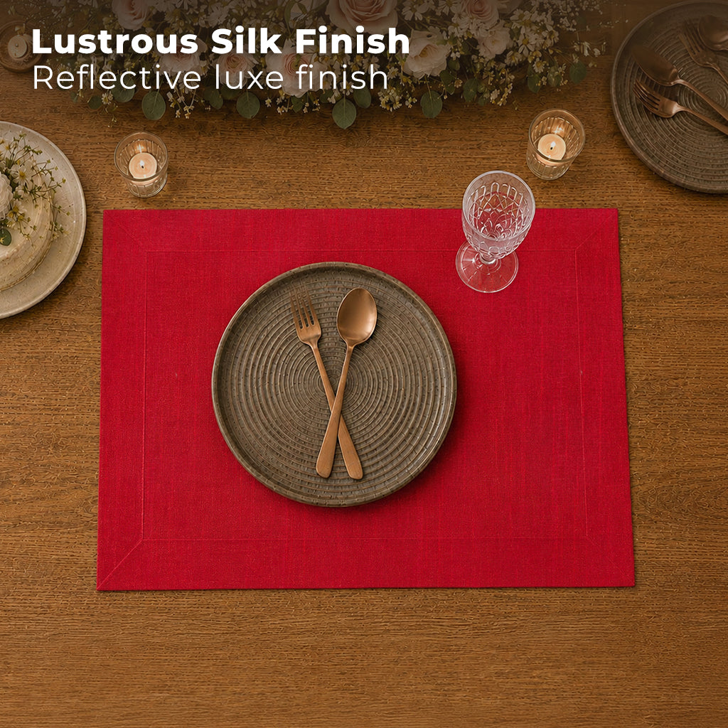 Tango red Luxe Shine placemats styled on a dining table