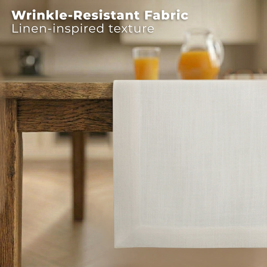 White faux linen table runner styled on a dining table