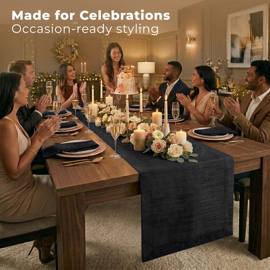 Close-up of the mitered corners on a black Luxe Shine table runner