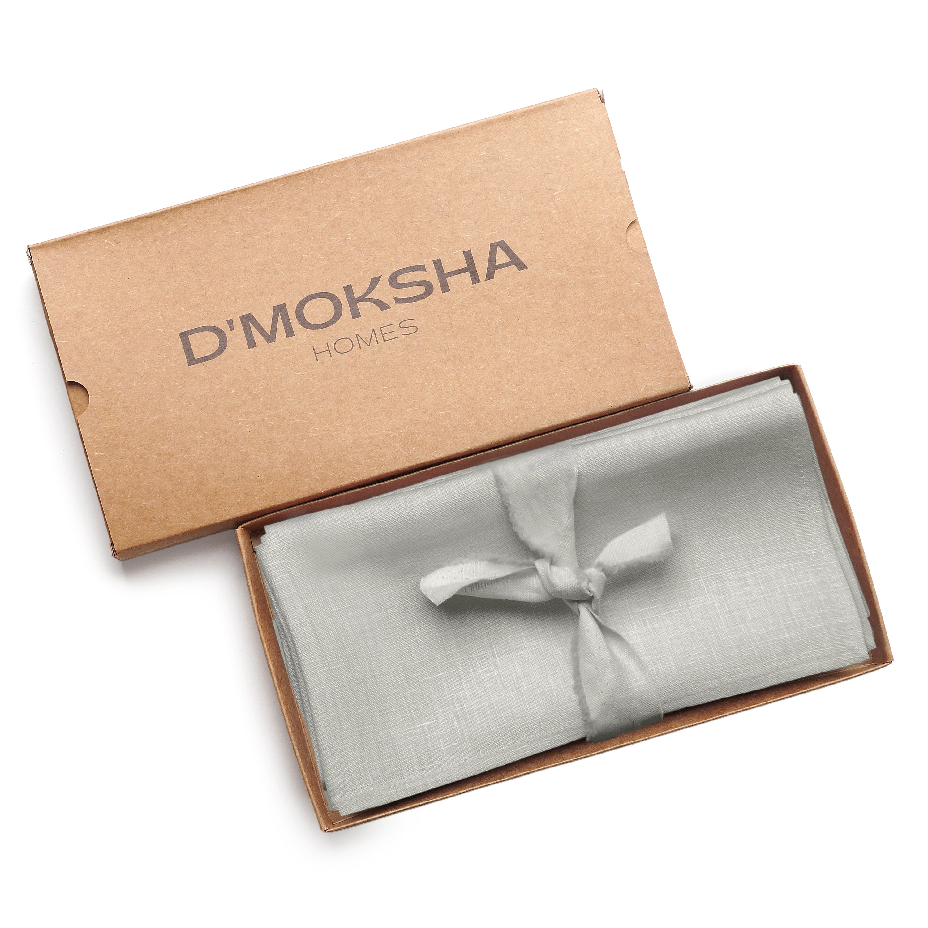 Close-up of the mitered corners on silver grey pure linen dinner napkins