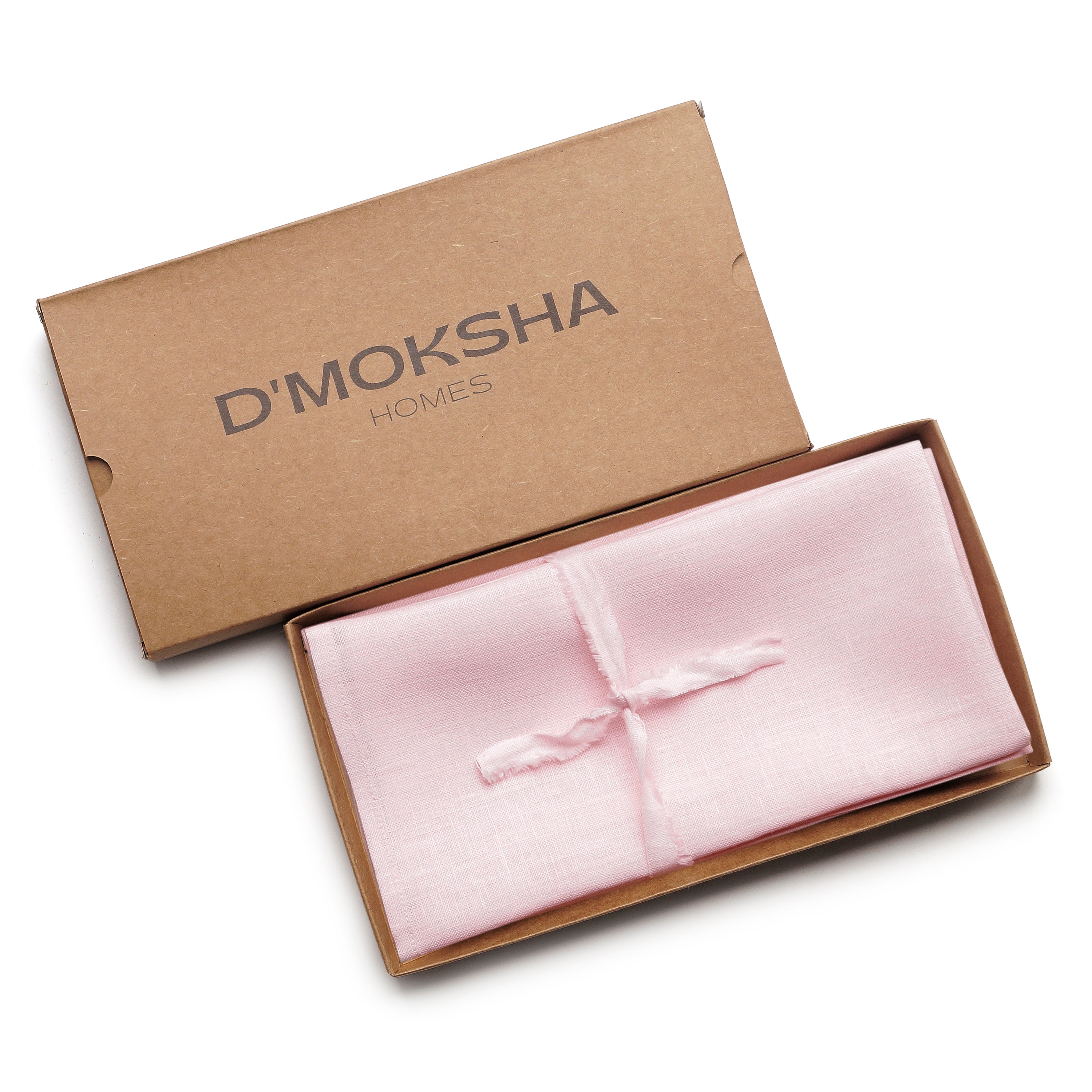 Close-up of the mitered corners on pastel pink pure linen dinner napkins